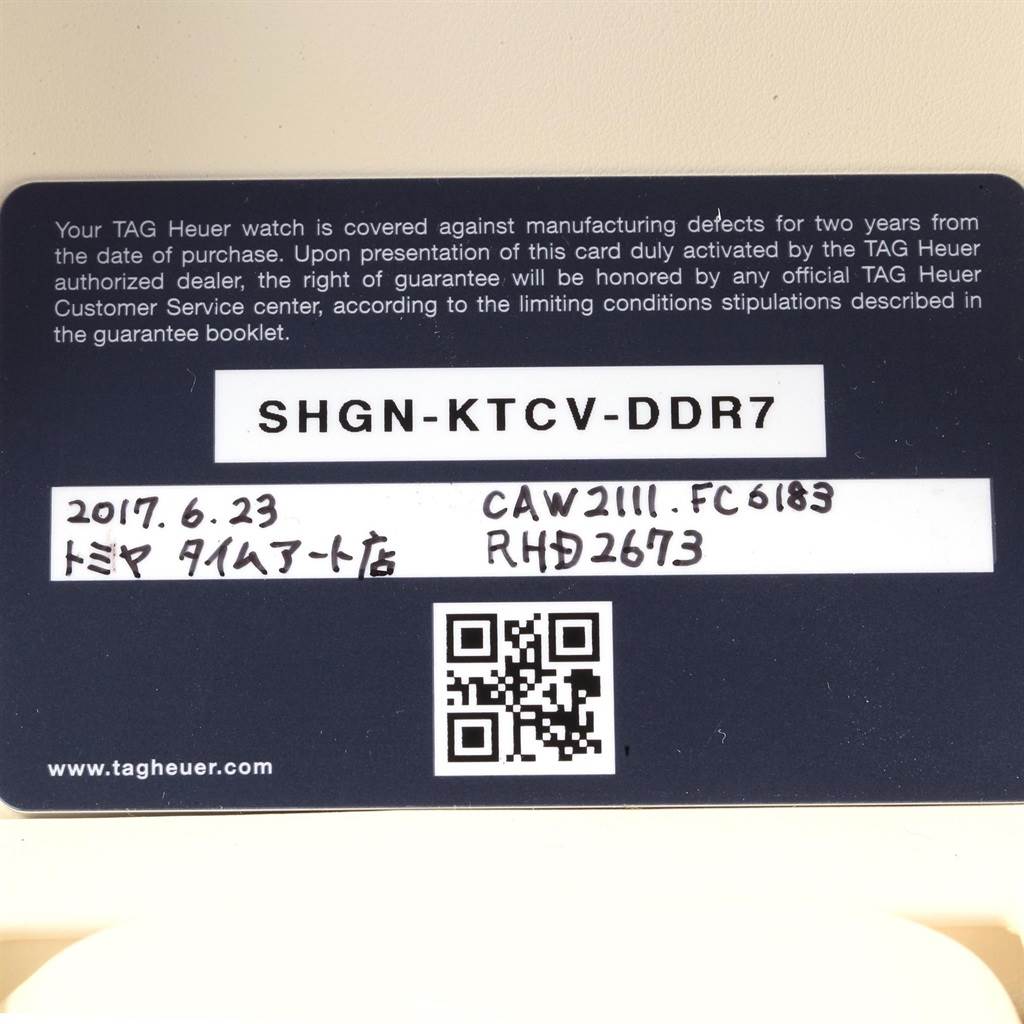 This image shows a warranty card for the Tag Heuer Monaco CAW2111 Men's Stainless Steel Blue Dial CAW2111 Men's Stainless Steel Blue Dial model watch.