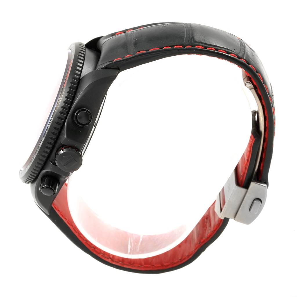 The image shows a side view of a Tag Heuer Carrera CAV518B.FT6016 Men
s Stainless Steel Black Dial CAV518B.FT6016 Men
s Stainless Steel Black Dial watch displaying its case, crown, pushers, and leather strap with red stitching.