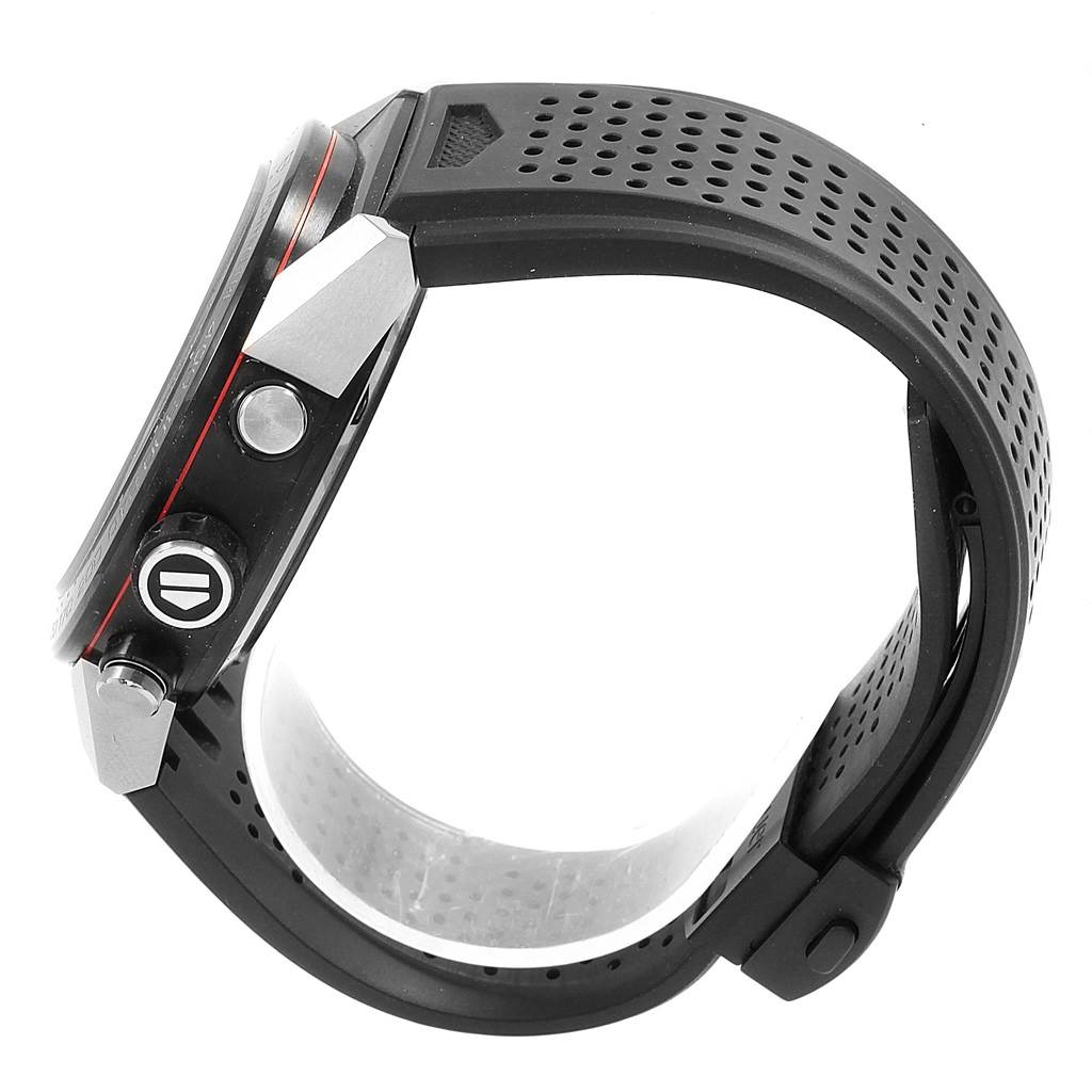 This image shows a side view of the Tag Heuer Carrera CAR2A1Z.FT6044 Men's Titanium Black Dial CAR2A1Z.FT6044 Men's Titanium Black Dial watch, showcasing its crown, pushers, and perforated black strap.