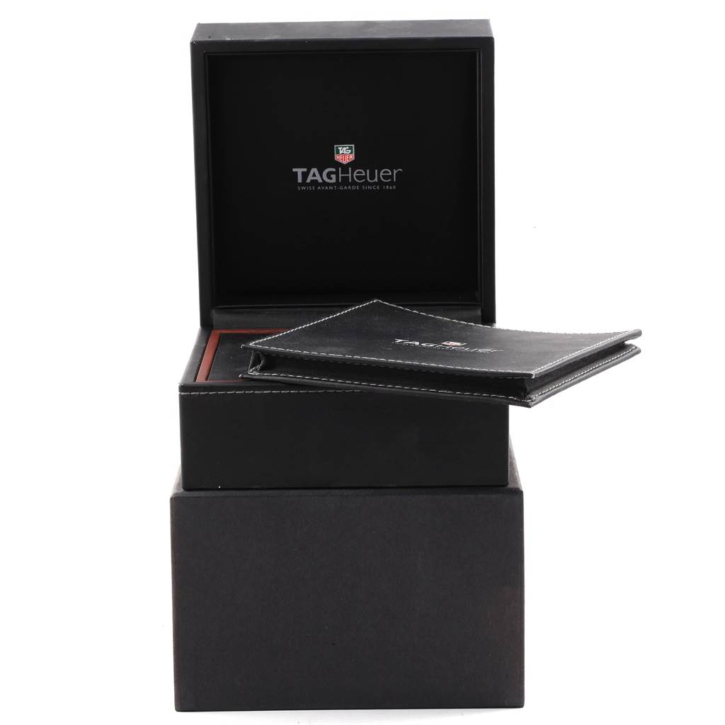 The image shows the packaging box and booklet for the Tag Heuer Carrera CAR2A1Z.FT6044 Men's Titanium Black Dial CAR2A1Z.FT6044 Men's Titanium Black Dial watch from a front angle.
