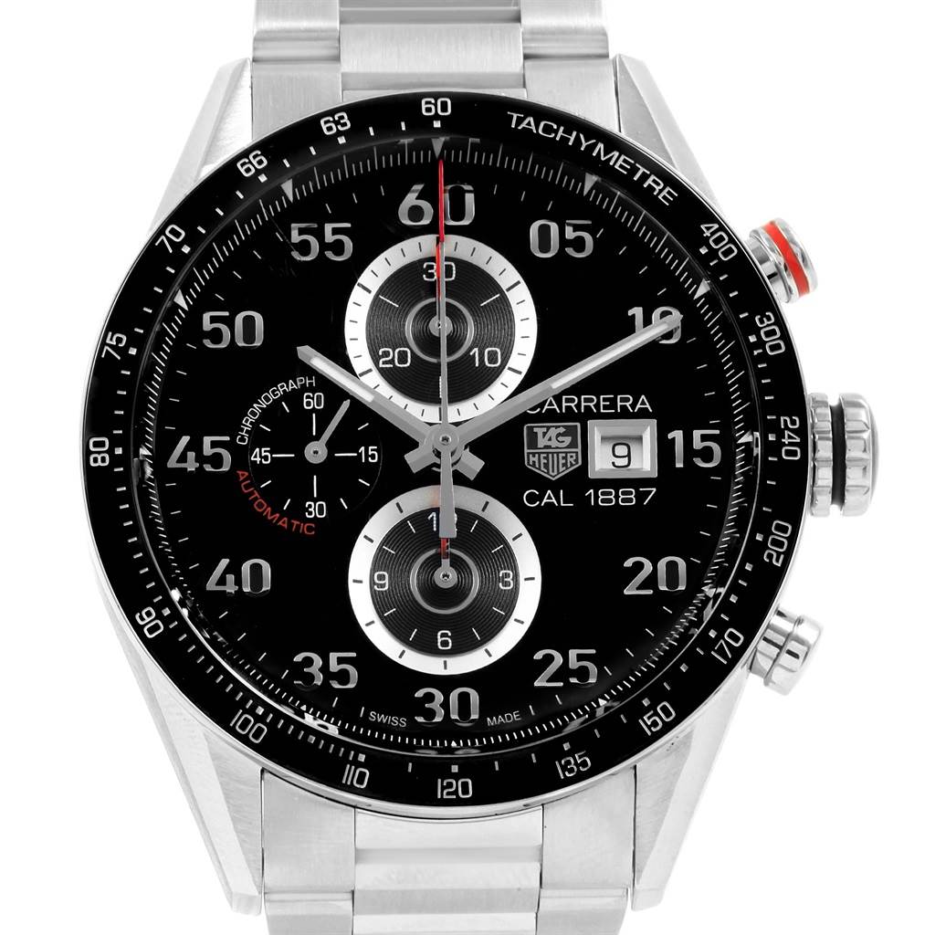 The image shows a front view of the Tag Heuer Carrera CAR2A10.BA0799 Men's Stainless Steel Black Dial CAR2A10.BA0799 Men's Stainless Steel Black Dial watch, highlighting its dial, subdials, tachymeter, and crown.