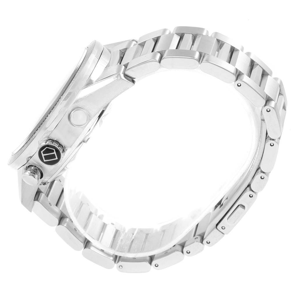 The image shows a side view of the Tag Heuer Carrera CAR2A10.BA0799 Men's Stainless Steel Black Dial CAR2A10.BA0799 Men's Stainless Steel Black Dial watch, highlighting its crown, bracelet links, and clasp.