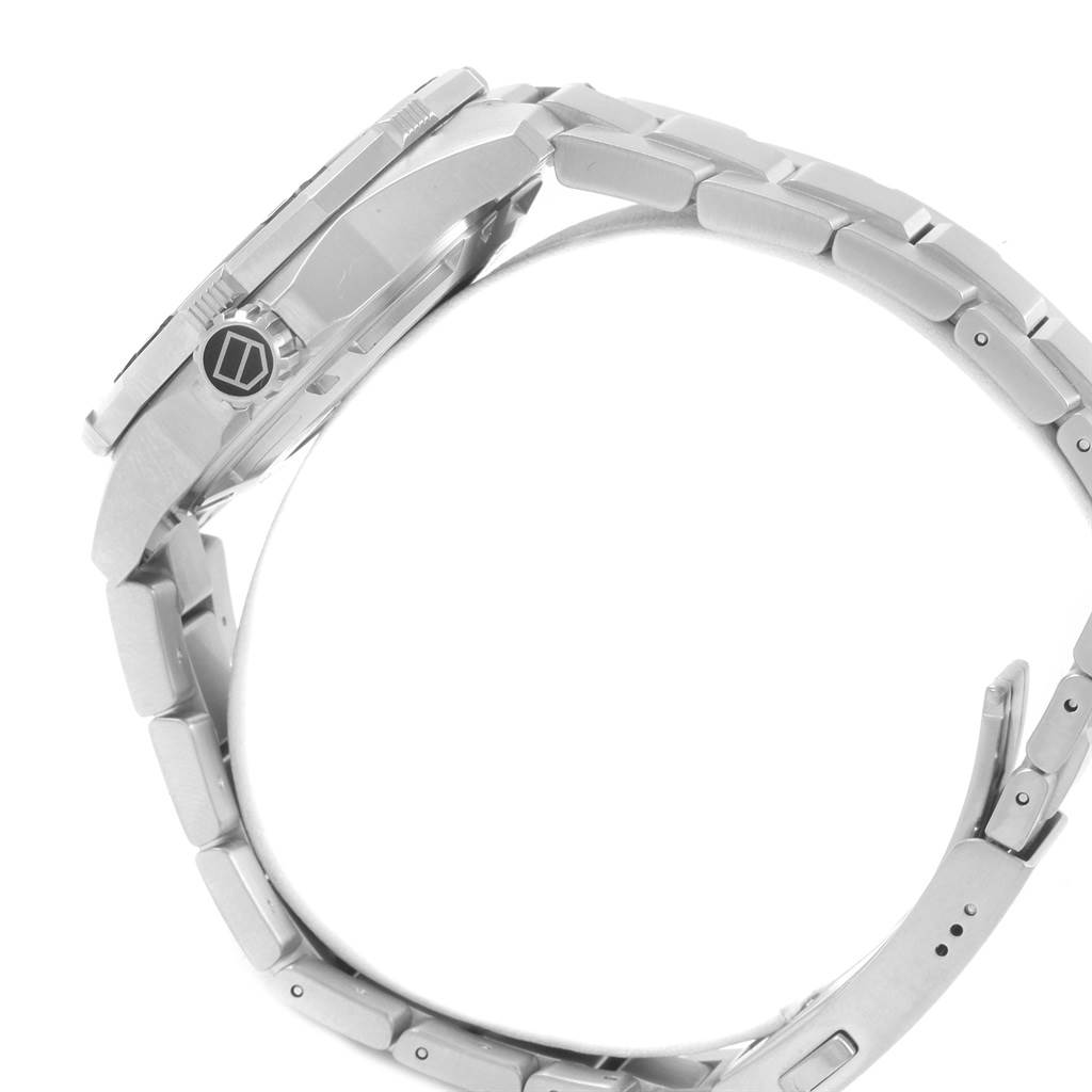 The image shows a side view of a Tag Heuer Aquaracer WAJ1111.BA0870 Men's Stainless Steel Grey Dial WAJ1111.BA0870 Men's Stainless Steel Grey Dial watch, highlighting the case, crown, and bracelet.