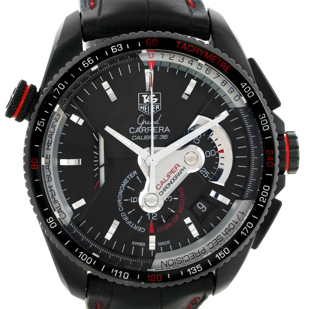 The image shows a close-up frontal view of a Tag Heuer Carrera CAV5185.FC6237 Men's Titanium Black Dial CAV5185.FC6237 Men's Titanium Black Dial watch, highlighting the dial, hands, indices, and tachymeter scale.