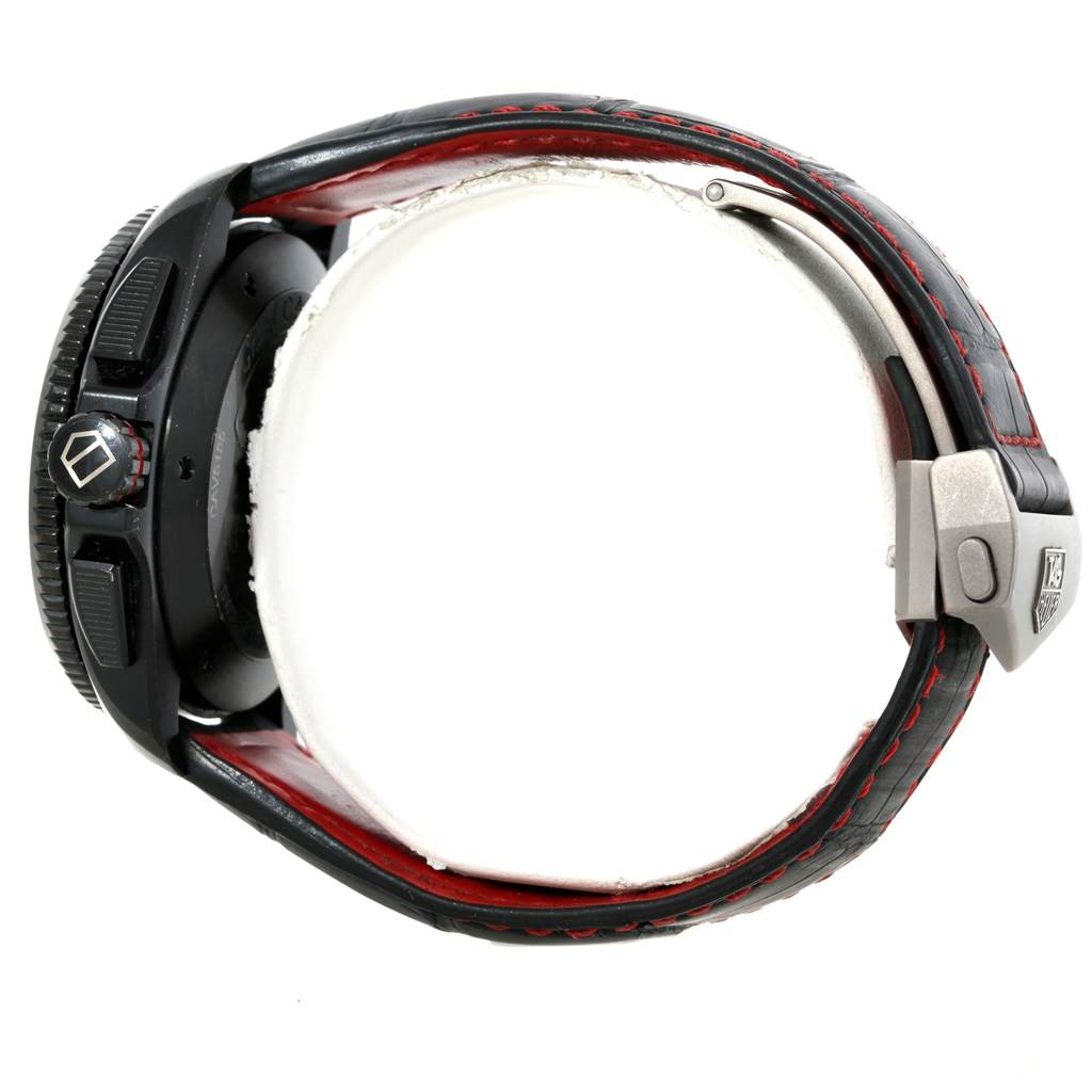 The image shows a side view of the Tag Heuer Carrera CAV5185.FC6237 Men's Titanium Black Dial CAV5185.FC6237 Men's Titanium Black Dial watch, focusing on the crown, push buttons, and clasp of the strap.