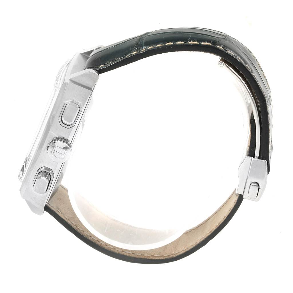 This image shows a side view of a Tag Heuer Limited Edition CW2118.FC6207 Men's Stainless Steel White Dial CW2118.FC6207 Men's Stainless Steel White Dial watch, displaying the case, crown, pushers, and leather strap.