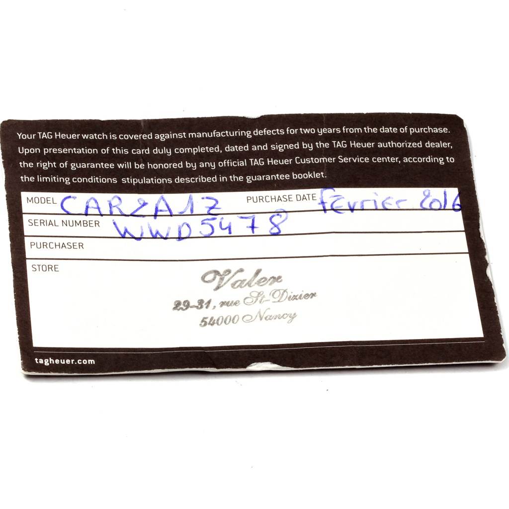 The image shows a warranty card for a Tag Heuer Carrera CAR2A1Z.FT6044 Men's Titanium Black Dial CAR2A1Z.FT6044 Men's Titanium Black Dial model watch, detailing the model and serial number.