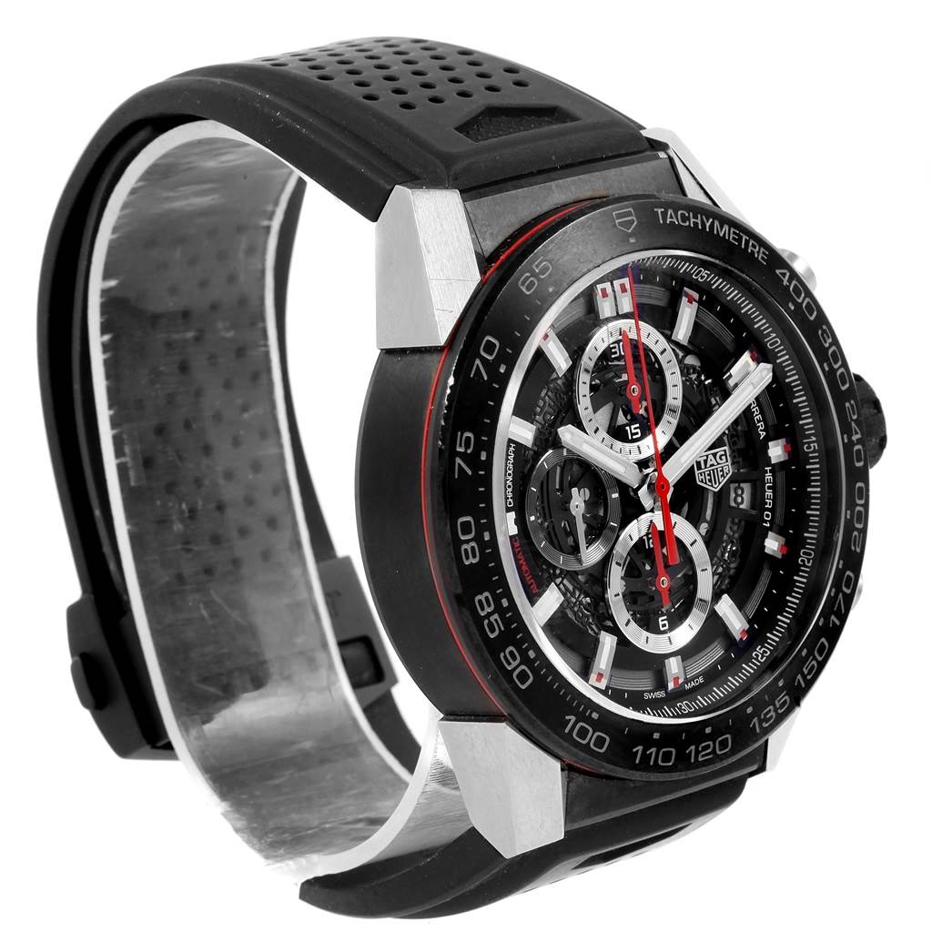 The image shows a Tag Heuer Carrera CAR2A1Z.FT6044 Men's Titanium Black Dial CAR2A1Z.FT6044 Men's Titanium Black Dial watch from a three-quarter angle, highlighting its face, bezel, and perforated black strap.