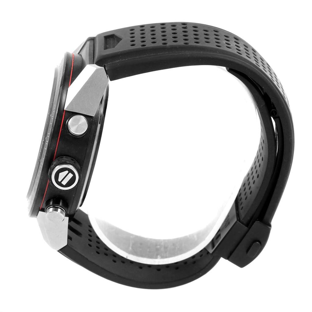 The image shows a side view of the Tag Heuer Carrera CAR2A1Z.FT6044 Men's Titanium Black Dial CAR2A1Z.FT6044 Men's Titanium Black Dial watch, highlighting the case, crown, and pushers, along with its perforated black strap.