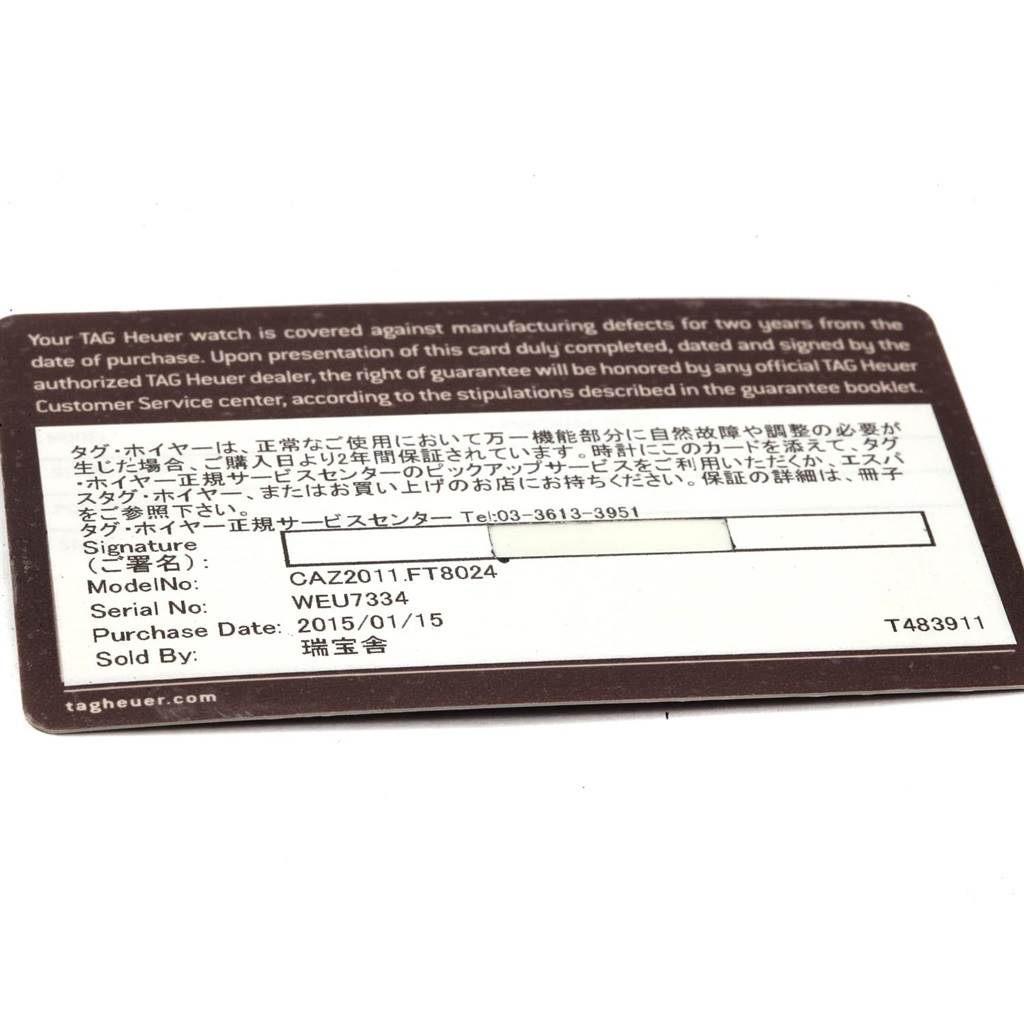 The image shows a warranty card for the Tag Heuer Formula 1 CAZ2011.FT8024 Men's Titanium Black Dial CAZ2011.FT8024 Men's Titanium Black Dial model CAZ2011.FT8024, viewed from the front.