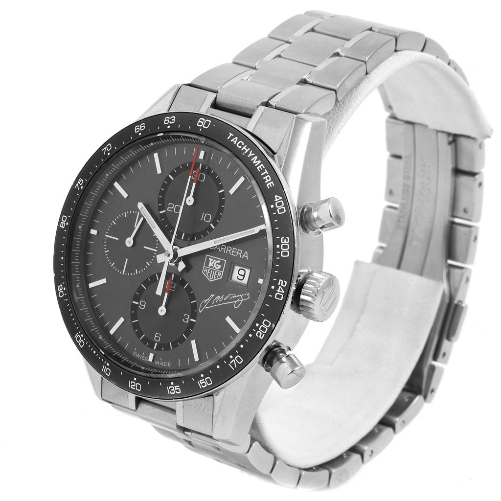 The image shows a Tag Heuer Carrera Limited Edition watch at a side angle, highlighting the dial, tachymeter, and metal bracelet.