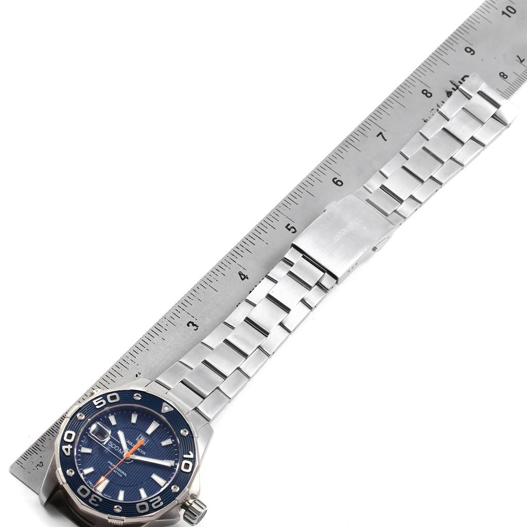 The image shows a Tag Heuer Aquaracer WAJ1112.BA0871 Men's Stainless Steel Blue Dial WAJ1112.BA0871 Men's Stainless Steel Blue Dial watch, displayed flat, featuring the face, bezel, and metal bracelet with a ruler for scale.