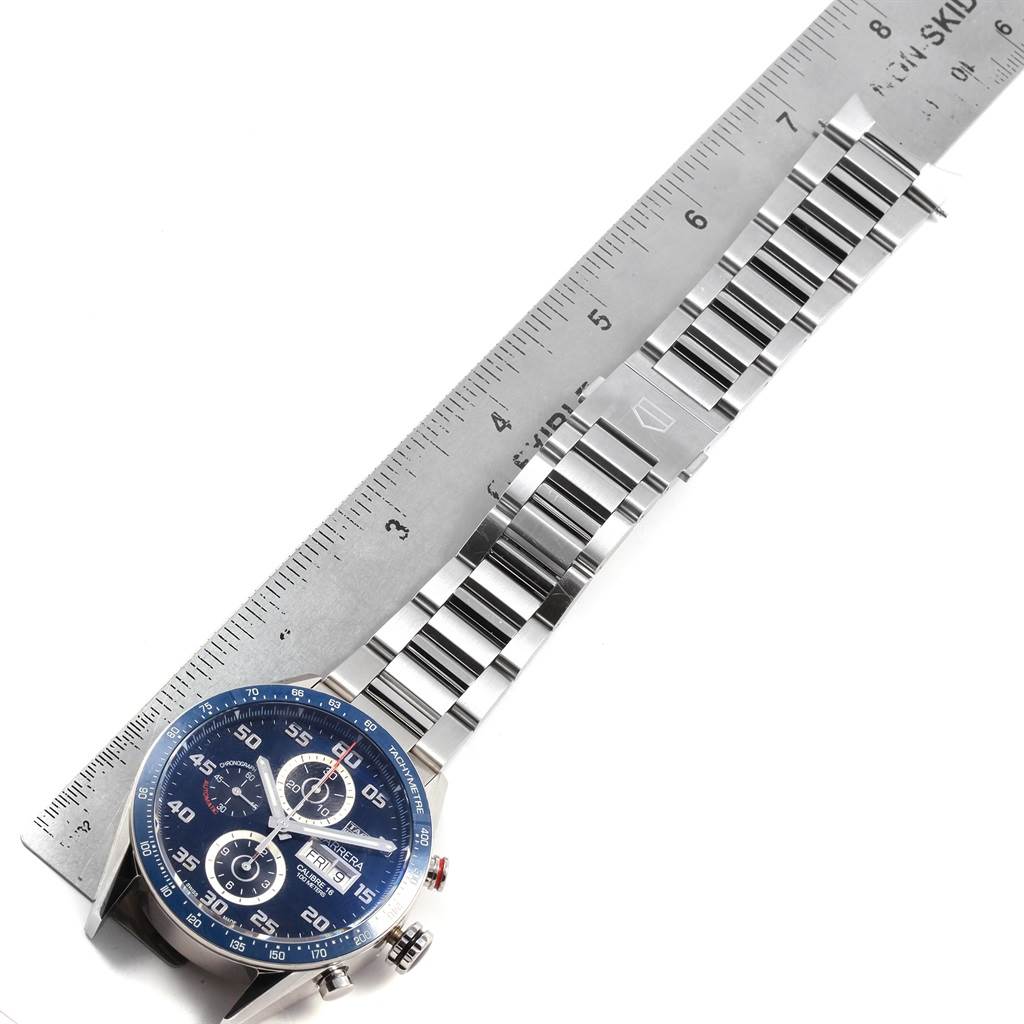 The image shows a Tag Heuer Carrera CV2A1V.BA0738 Men's Stainless Steel Blue Dial CV2A1V.BA0738 Men's Stainless Steel Blue Dial watch laid flat with its metal band measured by a ruler.