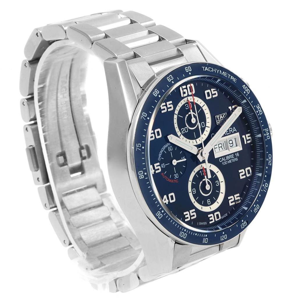 This Tag Heuer Carrera CV2A1V.BA0738 Men's Stainless Steel Blue Dial CV2A1V.BA0738 Men's Stainless Steel Blue Dial watch is shown at an angle revealing the bracelet, casing, and dial with a tachymeter.