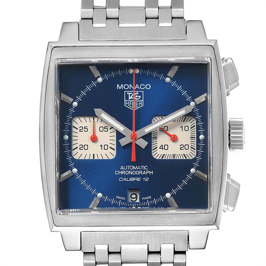 The image displays a frontal view of a Tag Heuer Monaco watch, highlighting its blue dial and square case.