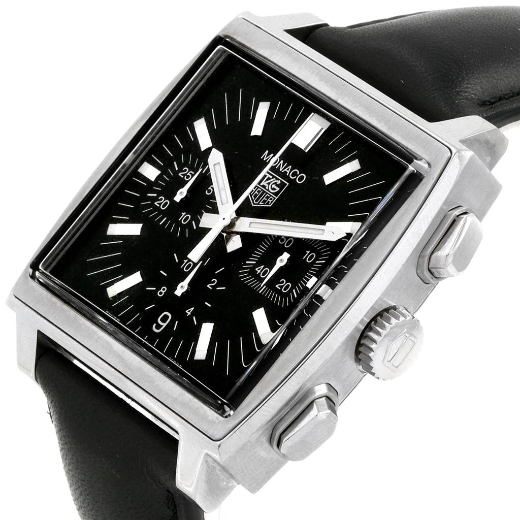 The image shows a close-up angle of the Tag Heuer Monaco CW2111 Men
s Stainless Steel Black Dial CW2111 Men
s Stainless Steel Black Dial watch, focusing on the square dial, black leather strap, crown, and push buttons.