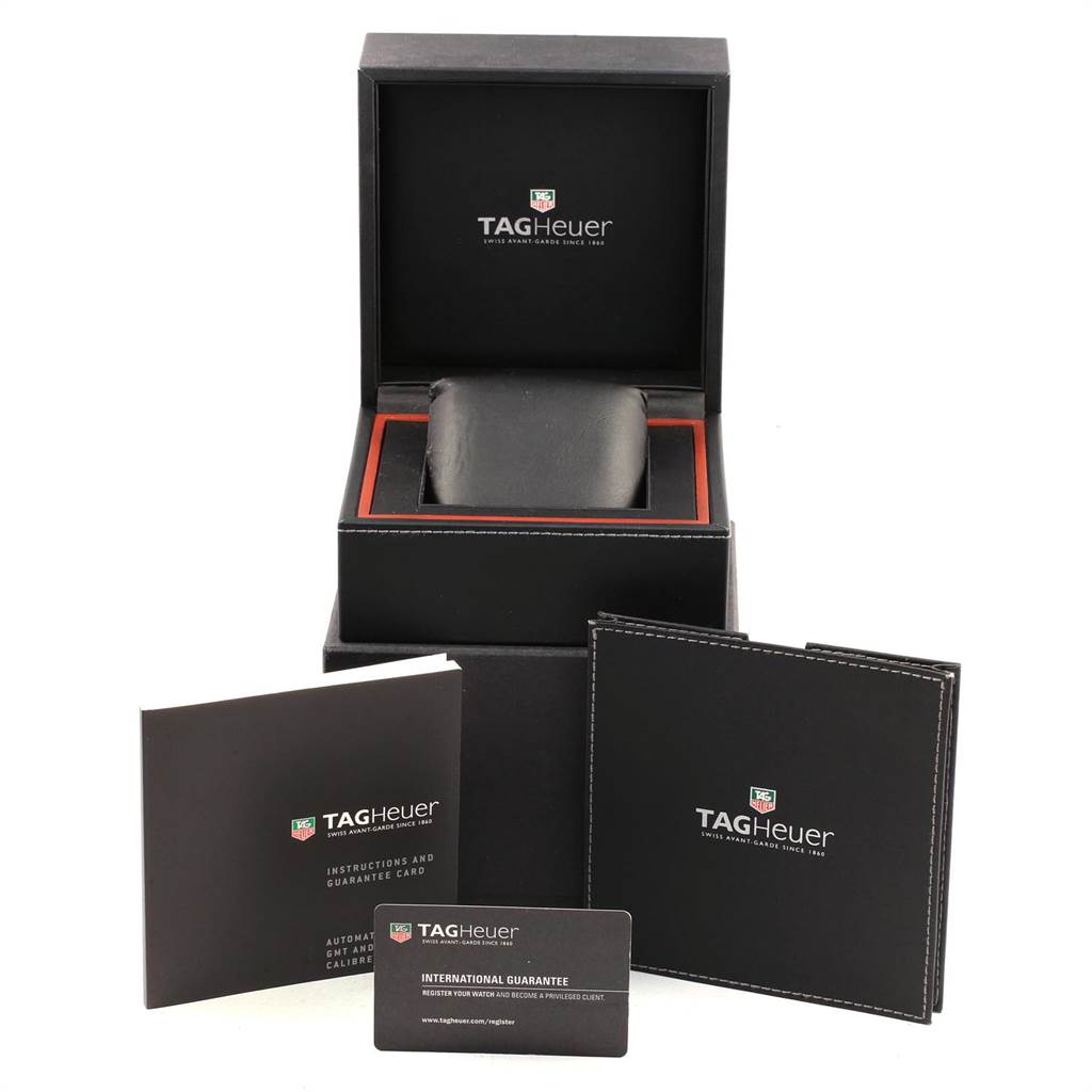 This image shows the packaging, instruction booklet, and international guarantee card for a Tag Heuer Aquaracer WAJ2110.BA0870 Men
s Stainless Steel Black Dial WAJ2110.BA0870 Men
s Stainless Steel Black Dial watch.