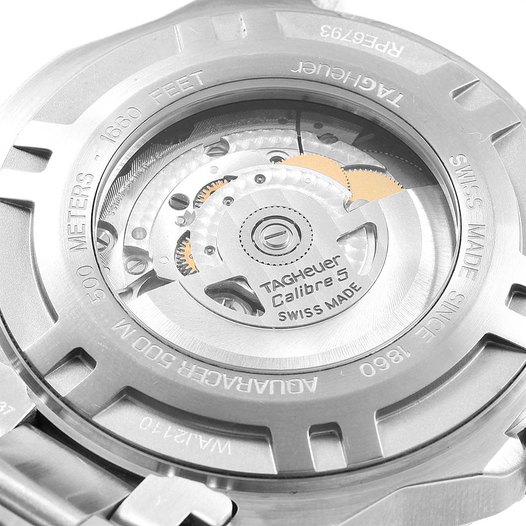 The image shows the back view of the Tag Heuer Aquaracer WAJ2110.BA0870 Men
s Stainless Steel Black Dial WAJ2110.BA0870 Men
s Stainless Steel Black Dial watch, highlighting its Calibre 5 mechanism.