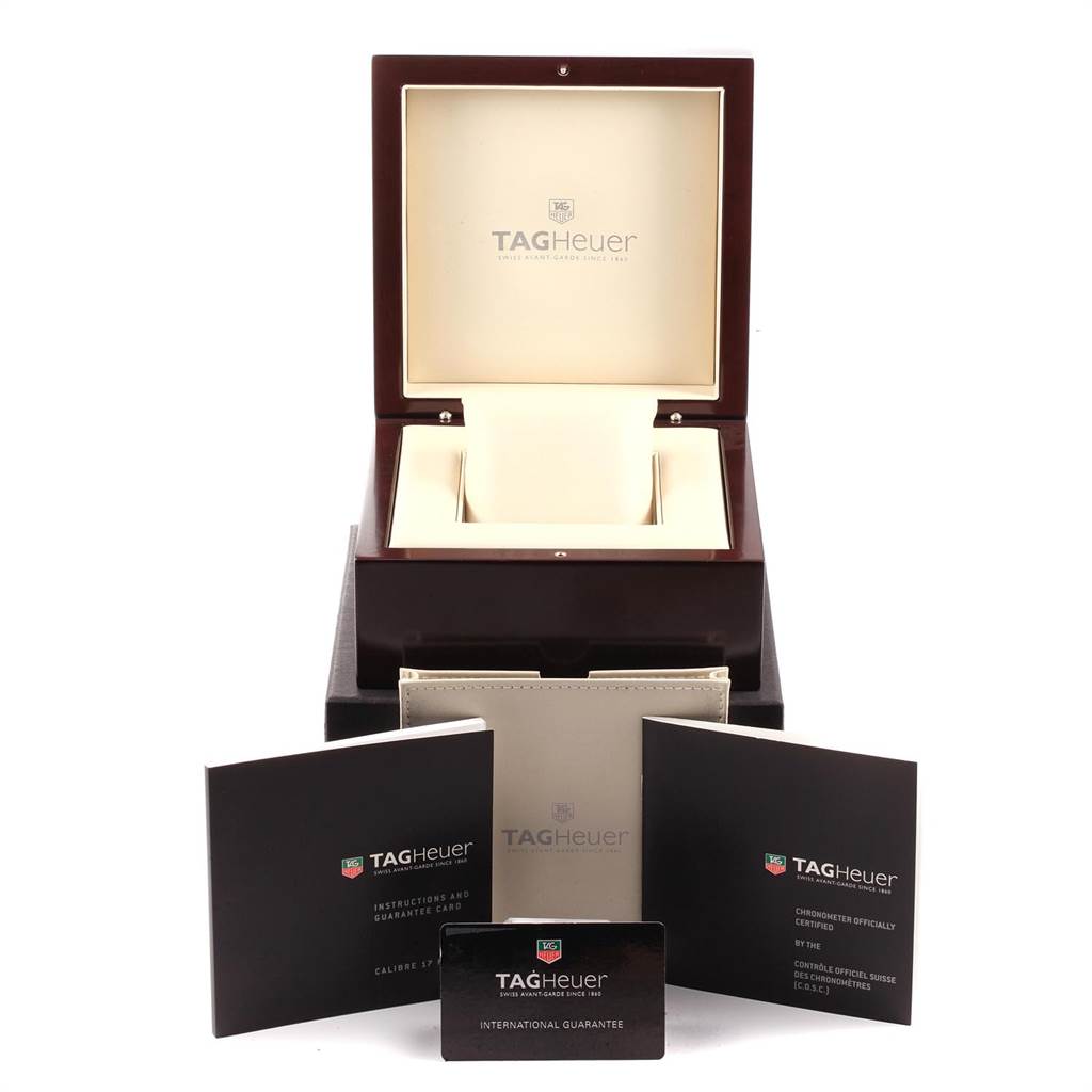 This image shows the box and accessories for the Tag Heuer Carrera CAV518B.FT6016 Men
s Stainless Steel Black Dial CAV518B.FT6016 Men
s Stainless Steel Black Dial watch, including warranty cards and manuals.