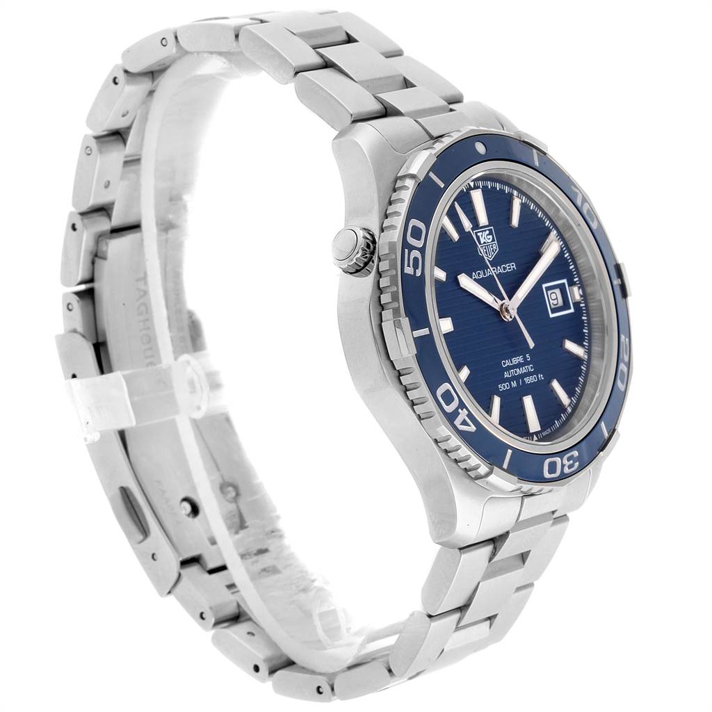 This image shows a side angle of a Tag Heuer Aquaracer WAK2111.BA0830 Men's Stainless Steel Blue Dial WAK2111.BA0830 Men's Stainless Steel Blue Dial watch featuring its blue dial, bezel, crown, and stainless steel bracelet.