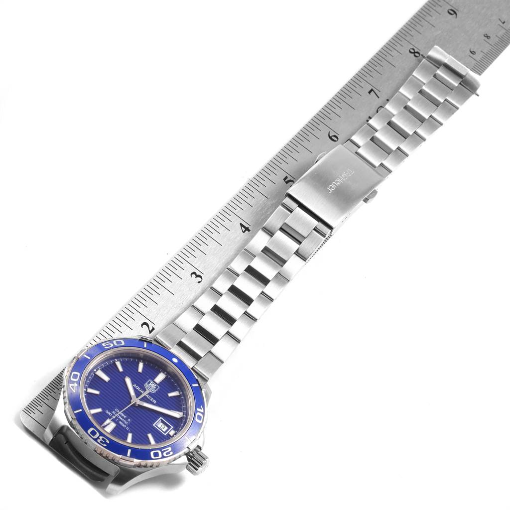 The image shows a Tag Heuer Aquaracer WAK2111.BA0830 Men's Stainless Steel Blue Dial WAK2111.BA0830 Men's Stainless Steel Blue Dial watch photographed flat with a ruler placed underneath, emphasizing the bracelet length.