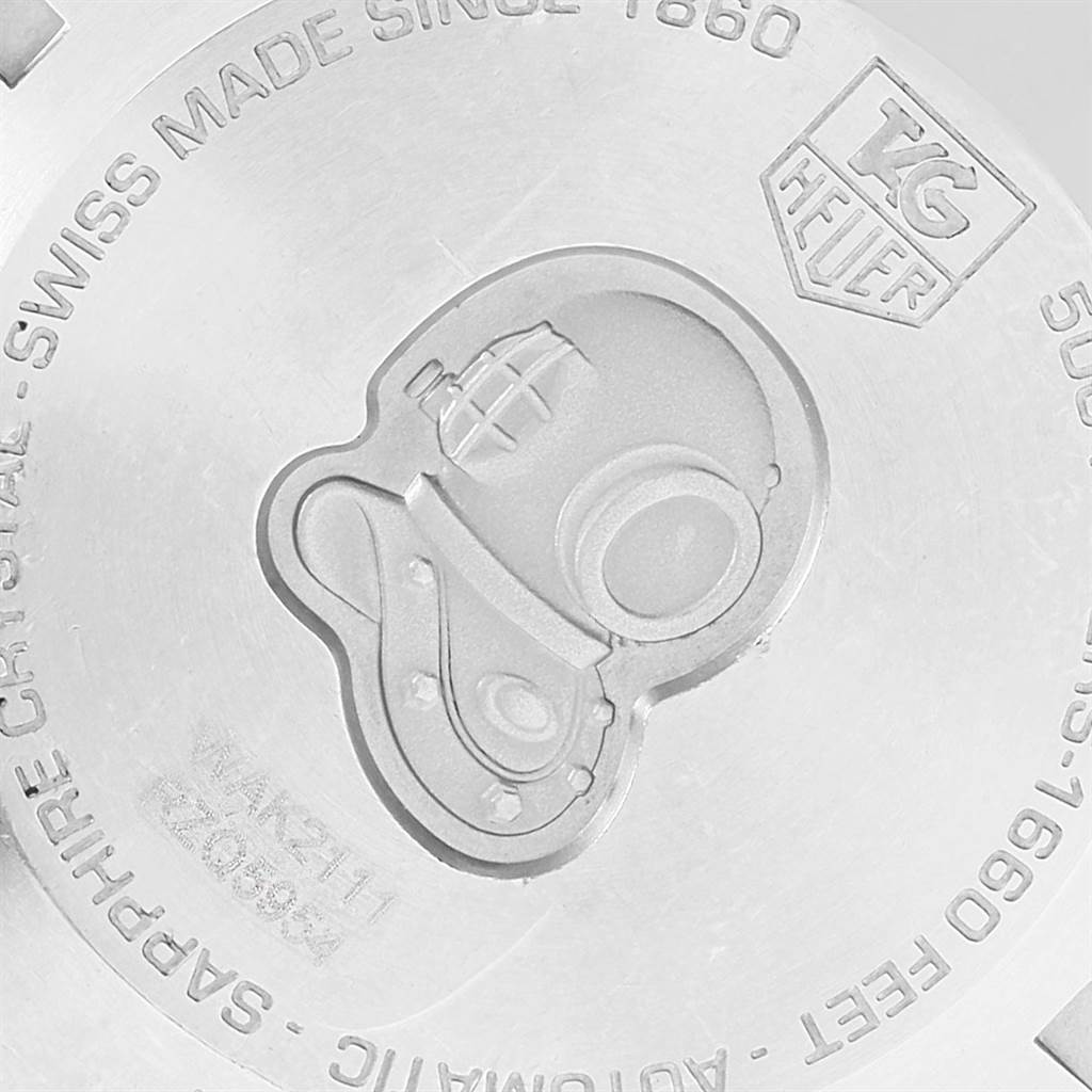 This image shows the back case of a Tag Heuer Aquaracer WAK2111.BA0830 Men's Stainless Steel Blue Dial WAK2111.BA0830 Men's Stainless Steel Blue Dial watch with an engraved diving helmet and branding details.