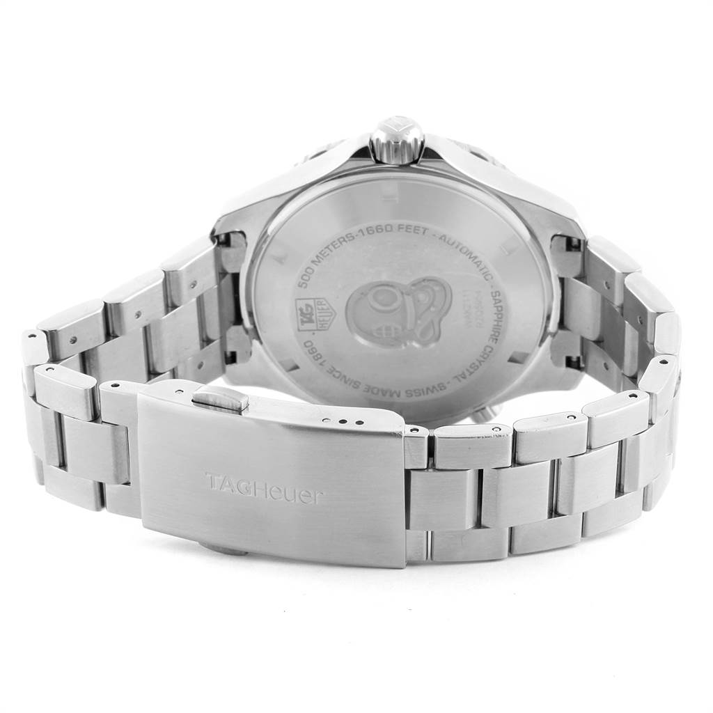 The image shows the back and clasp of a Tag Heuer Aquaracer WAK2111.BA0830 Men's Stainless Steel Blue Dial WAK2111.BA0830 Men's Stainless Steel Blue Dial watch, highlighting its stainless steel bracelet and engraved case back.