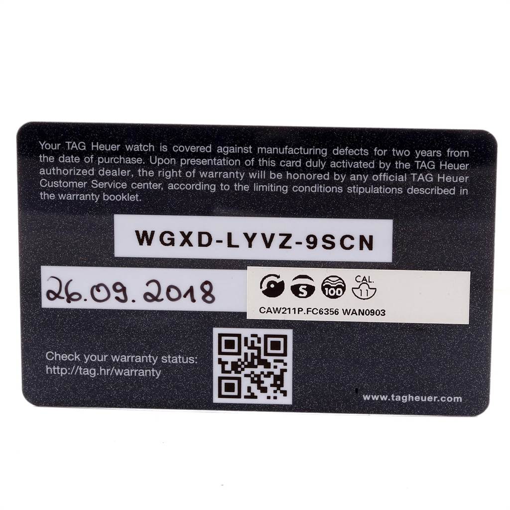 This image shows a warranty card for a Tag Heuer Monaco CAW211P Men's Stainless Steel Blue Dial CAW211P Men's Stainless Steel Blue Dial watch, including a serial number and purchase date.