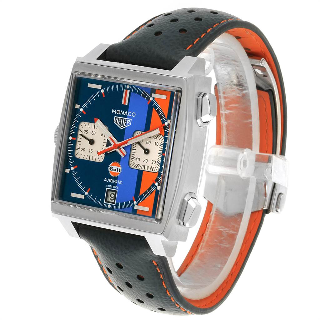 The image shows a Tag Heuer Monaco CAW211R.FC6401 Men's Stainless Steel Blue Dial CAW211R.FC6401 Men's Stainless Steel Blue Dial watch at a slight side angle, highlighting its face, dial, and black perforated strap with orange accents.