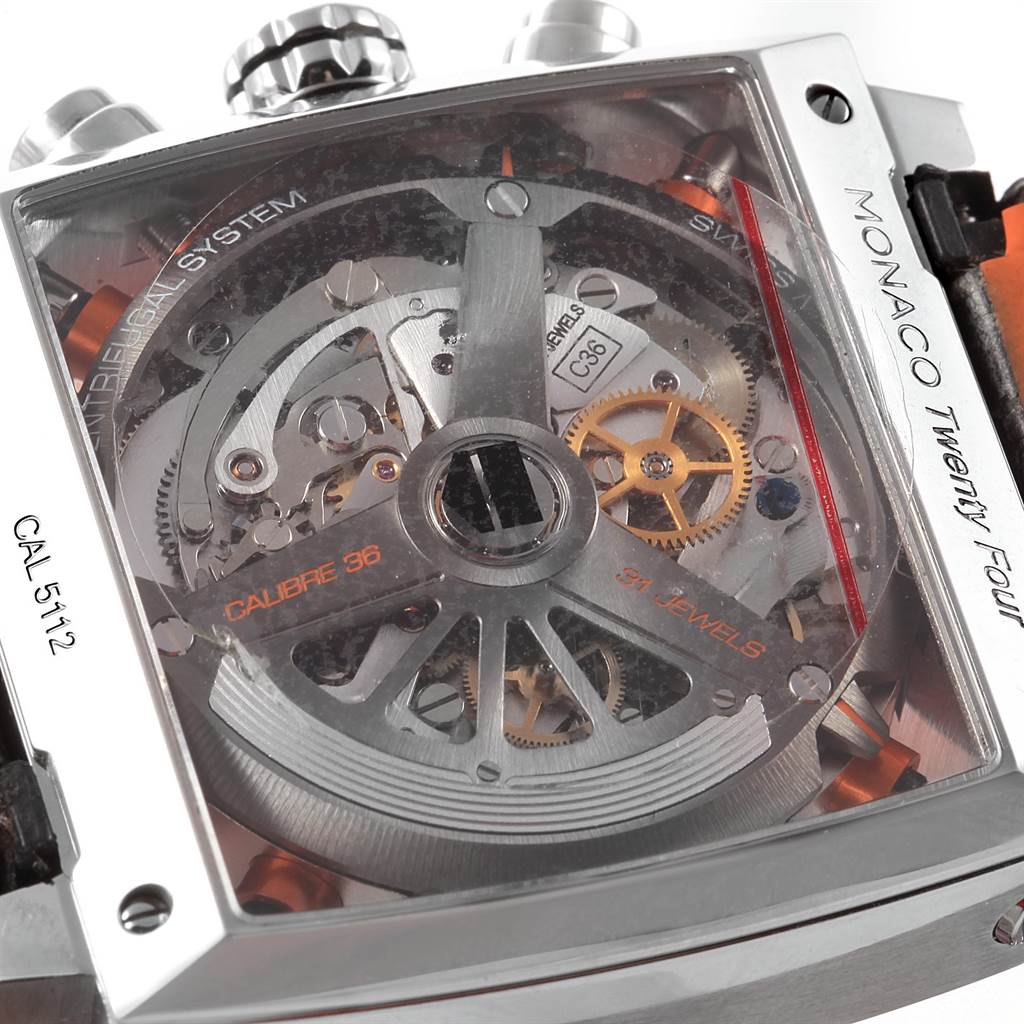 This is a close-up of the back of a Tag Heuer Monaco CAL5112.FC6298 Men's Stainless Steel Grey Dial CAL5112.FC6298 Men's Stainless Steel Grey Dial model watch, showing its intricate mechanical movement and rotor.