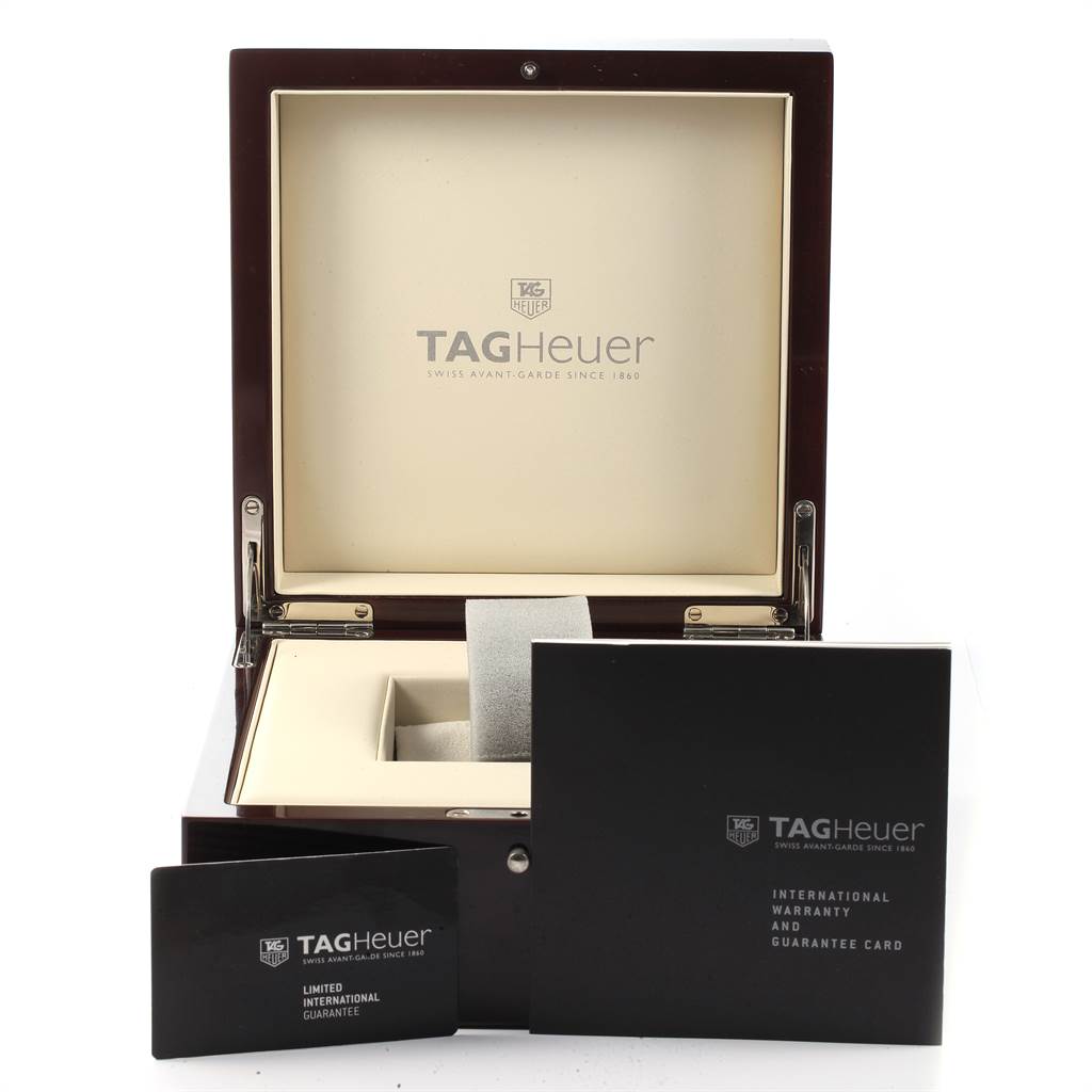 The image shows a Tag Heuer Monaco CAL5112.FC6298 Men's Stainless Steel Grey Dial CAL5112.FC6298 Men's Stainless Steel Grey Dial watch box, international warranty booklet, and guarantee card from a frontal angle.