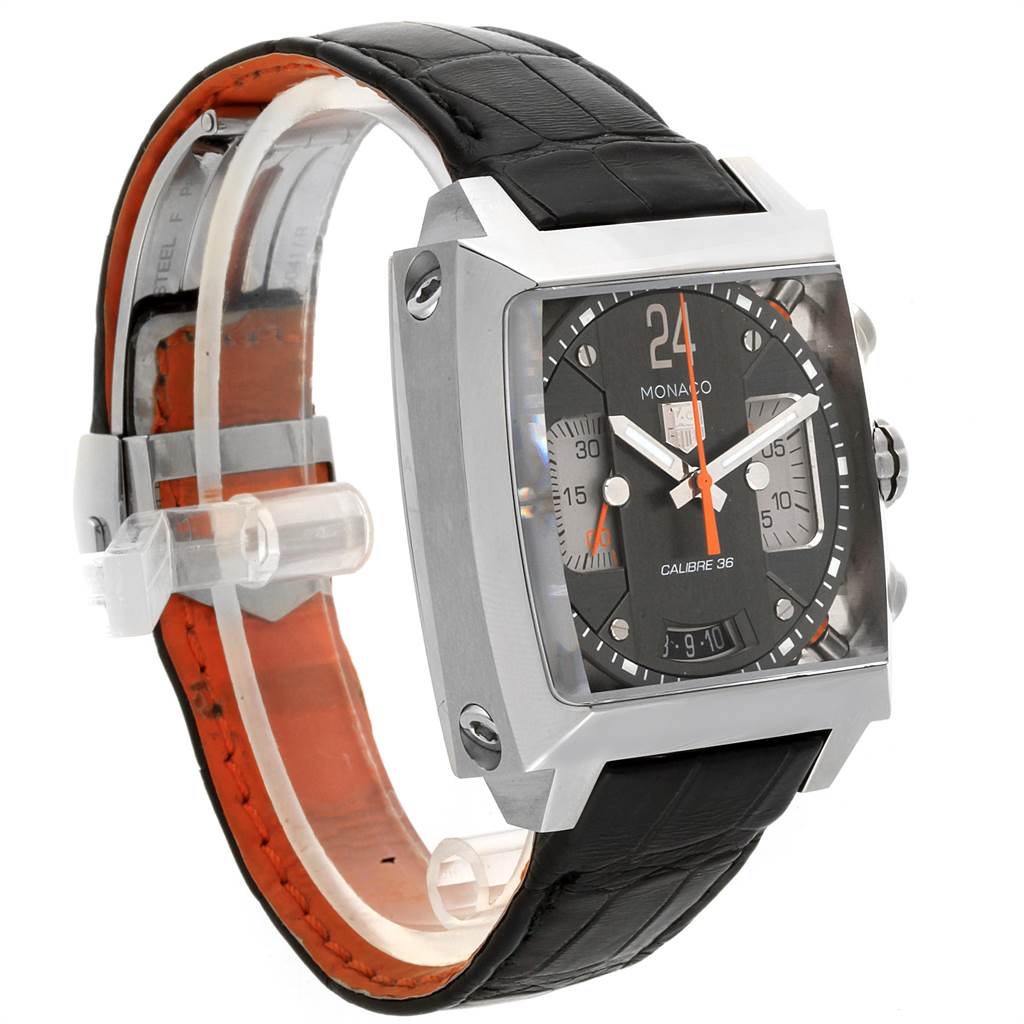 The image shows a Tag Heuer Monaco CAL5112.FC6298 Men's Stainless Steel Grey Dial CAL5112.FC6298 Men's Stainless Steel Grey Dial watch at a slight angle, featuring its square face, black leather strap, and stainless steel casing.