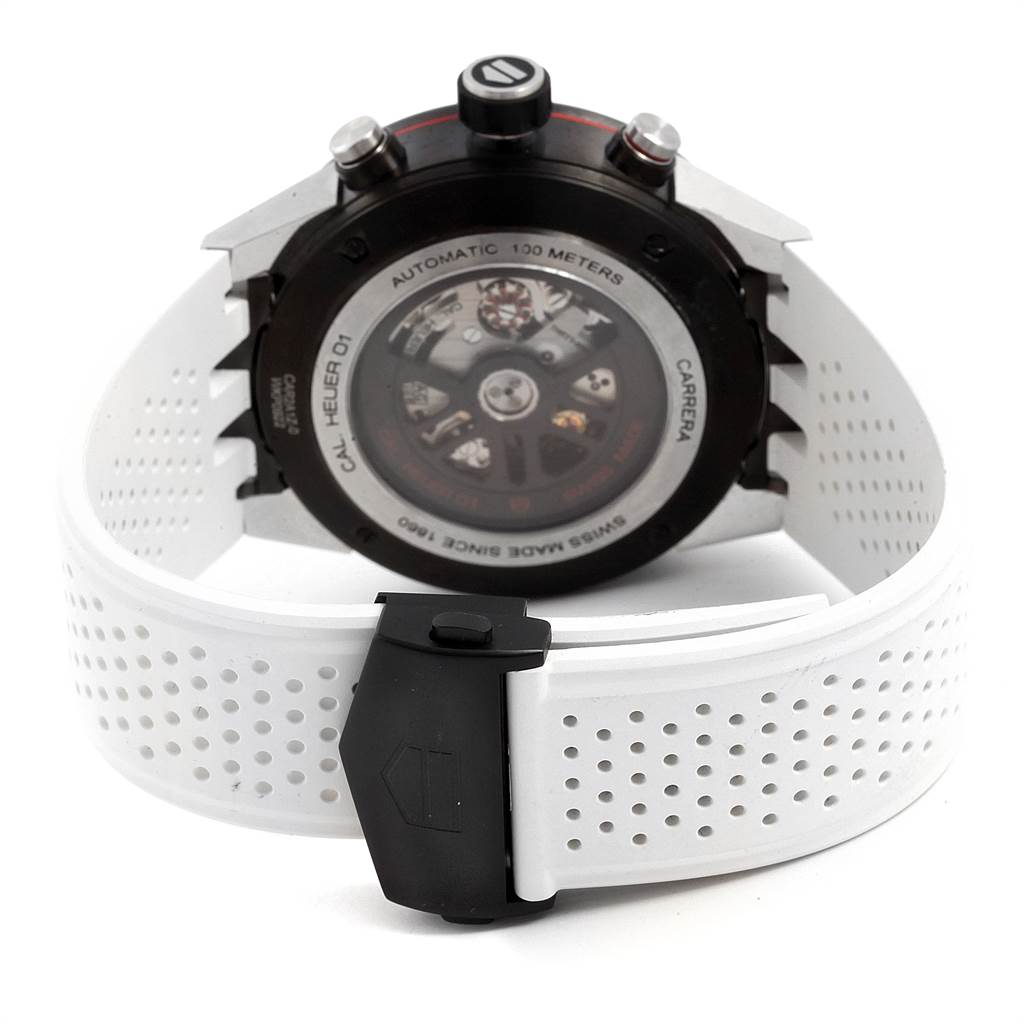 The image shows the back view of the Tag Heuer Carrera CAR2A1Z.FT6051 Men's Titanium Black Dial CAR2A1Z.FT6051 Men's Titanium Black Dial watch with its white perforated strap and visible automatic movement.