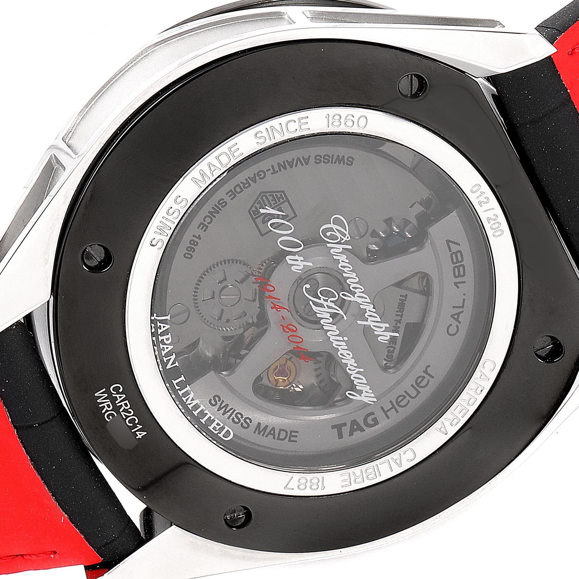 The image shows the back of a Tag Heuer Carrera CAR2C14 Men's Stainless Steel Grey Dial CAR2C14 Men's Stainless Steel Grey Dial watch with visible internal mechanisms and "100th Anniversary" inscription.