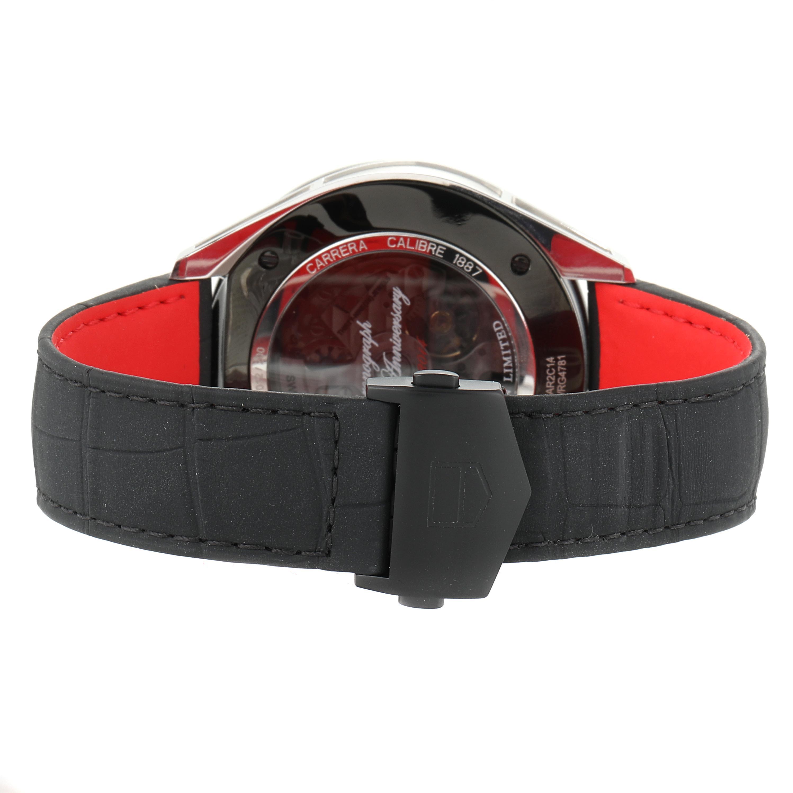 The image shows the backside of the Carrera model by Tag Heuer, highlighting the case back and black rubber strap.