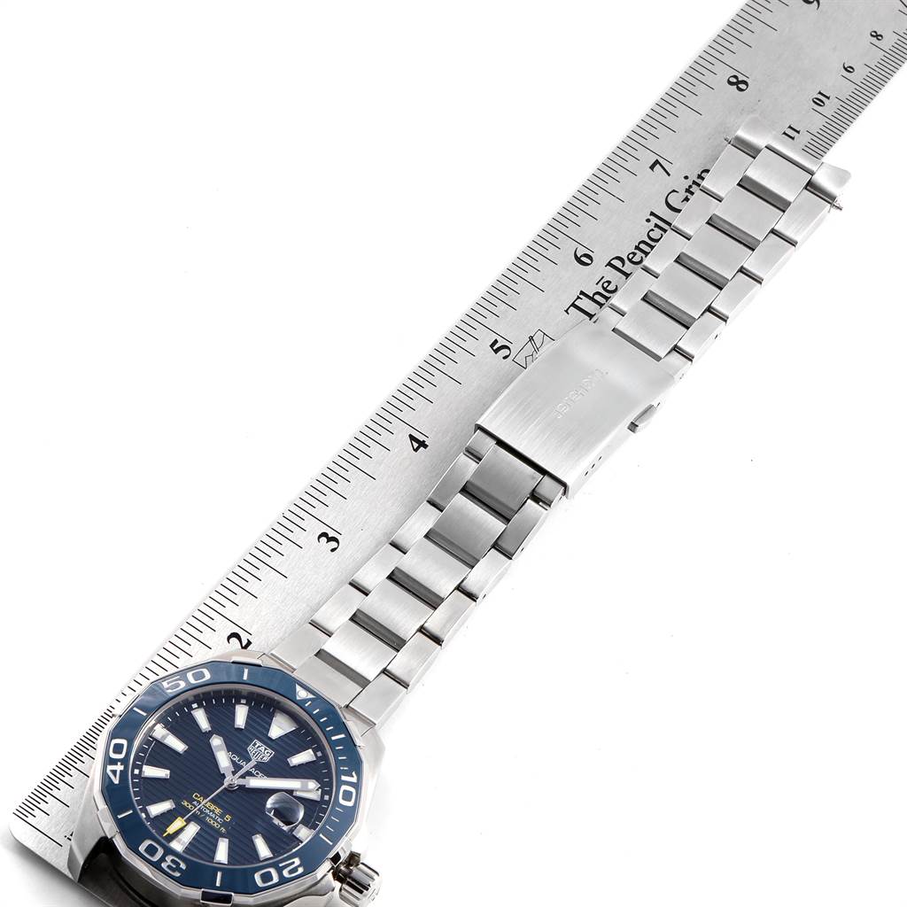 The image shows a top-down view of a Tag Heuer Aquaracer WAY201B Men's Stainless Steel Blue Dial WAY201B Men's Stainless Steel Blue Dial watch with a ruler measuring its stainless steel bracelet.