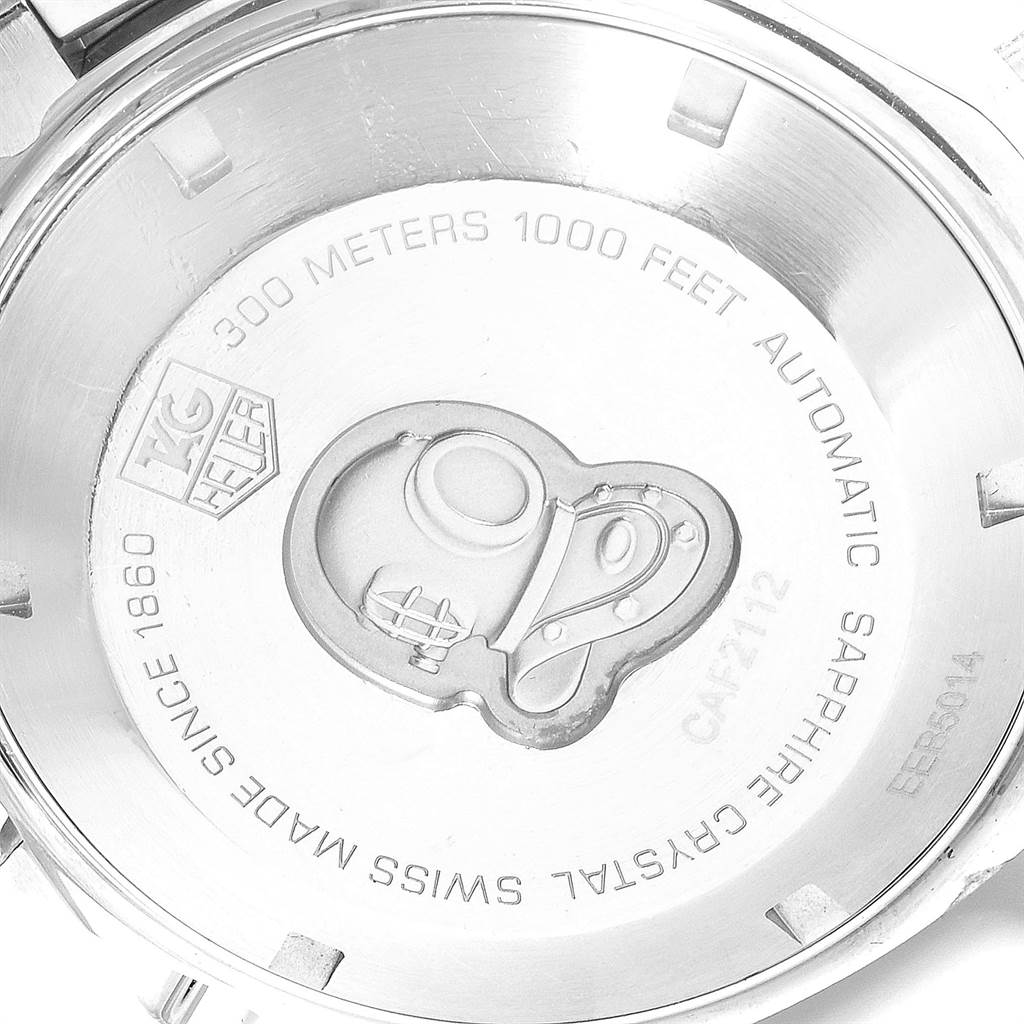 The image shows the back case of a Tag Heuer Aquaracer CAF2112 Men's Stainless Steel Blue Dial CAF2112 Men's Stainless Steel Blue Dial watch, displaying details about water resistance and material.