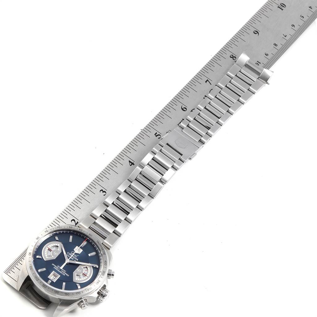 The image shows a Tag Heuer Limited Edition CAV511F.BA0902 Men's Stainless Steel Blue Dial CAV511F.BA0902 Men's Stainless Steel Blue Dial watch at a slight angle with the case, dial, bracelet, and a ruler for scale.