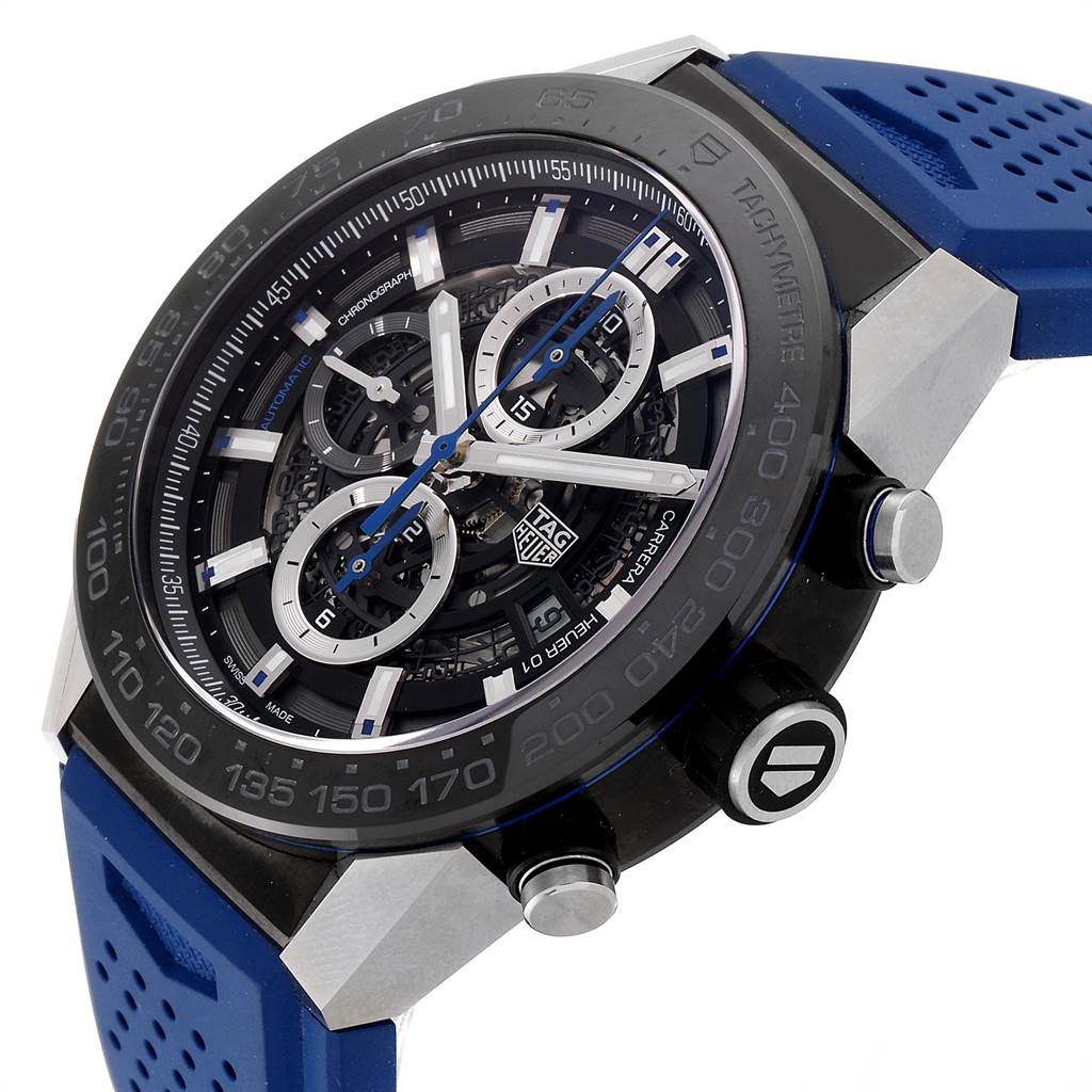 The Tag Heuer Carrera CAR2A1T.FT6052 Men's Titanium Black Dial CAR2A1T.FT6052 Men's Titanium Black Dial watch is shown at an angle displaying the dial, bezel, buttons, and the blue strap.
