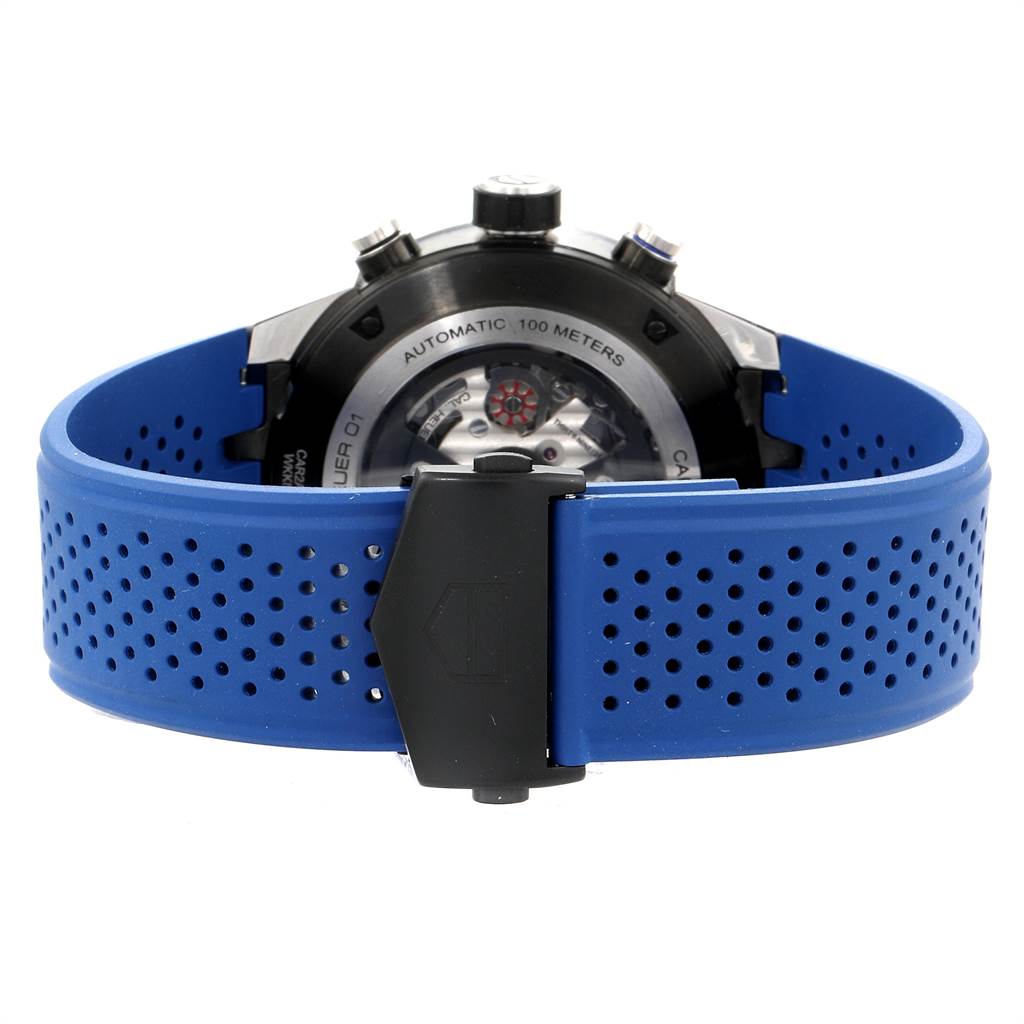 This image shows the back of a Tag Heuer Carrera CAR2A1T.FT6052 Men's Titanium Black Dial CAR2A1T.FT6052 Men's Titanium Black Dial watch with a blue perforated strap and clasp.