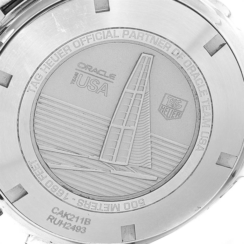 The image shows the back case of a Tag Heuer Aquaracer CAK211B.BA0833 Men's Stainless Steel Black Dial CAK211B.BA0833 Men's Stainless Steel Black Dial watch, featuring engraving and model details.