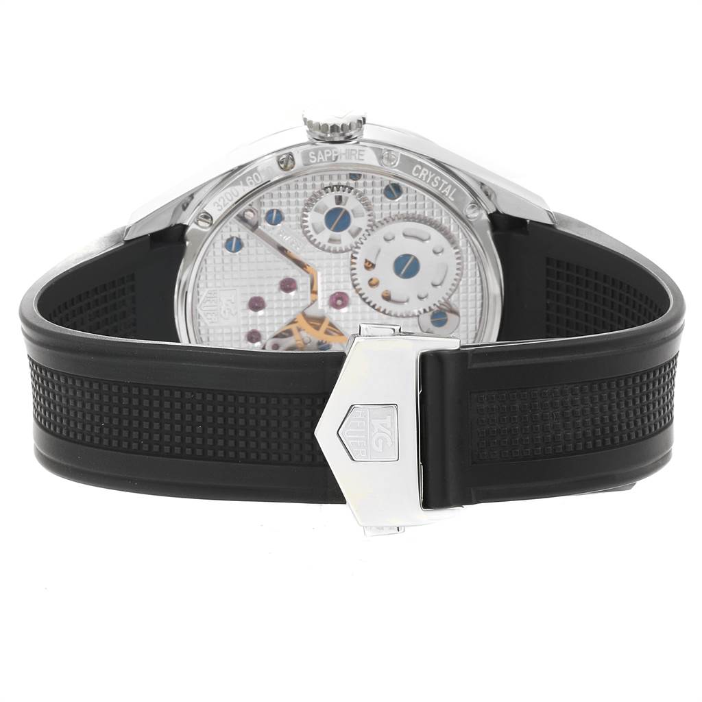 The image shows the back and clasp of the Tag Heuer Limited Edition WV3010.EB0025 Men's Stainless Steel Black Dial WV3010.EB0025 Men's Stainless Steel Black Dial watch, highlighting its internal mechanisms and black rubber strap.