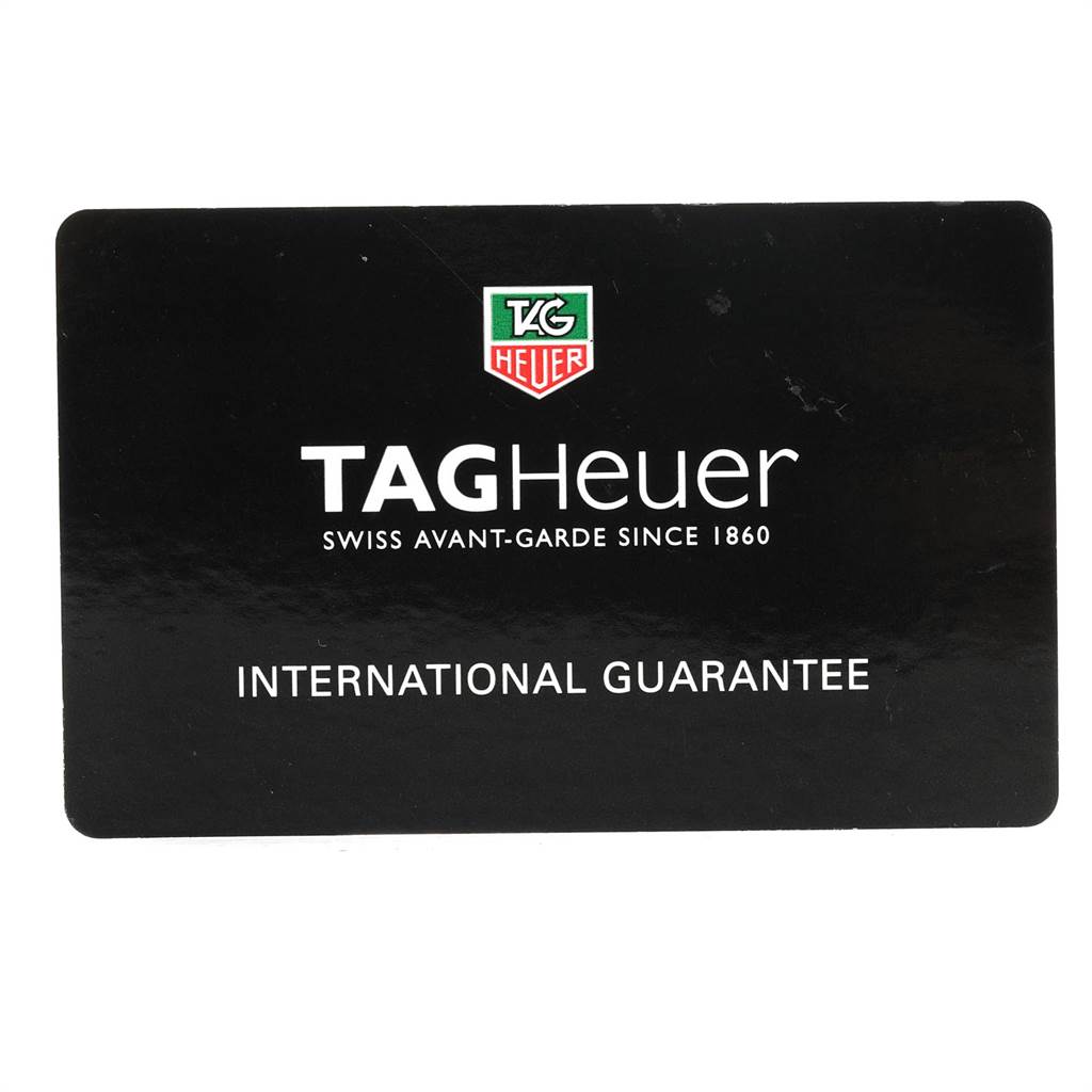 The image shows an international guarantee card for the Tag Heuer Aquaracer CAJ2110.BA0872 Men's Stainless Steel Black Dial CAJ2110.BA0872 Men's Stainless Steel Black Dial watch, viewed from the front.