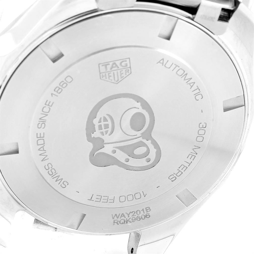 This image shows the back case of the Tag Heuer Aquaracer WAY201B Men's Stainless Steel Blue Dial WAY201B Men's Stainless Steel Blue Dial model watch, with engravings detailing its specifications and brand logo.