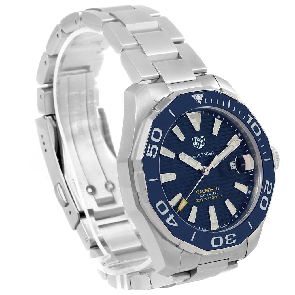 The image shows a Tag Heuer Aquaracer WAY201B Men's Stainless Steel Blue Dial WAY201B Men's Stainless Steel Blue Dial watch from a slight side angle, highlighting the blue dial, bezel, case, and stainless steel bracelet.