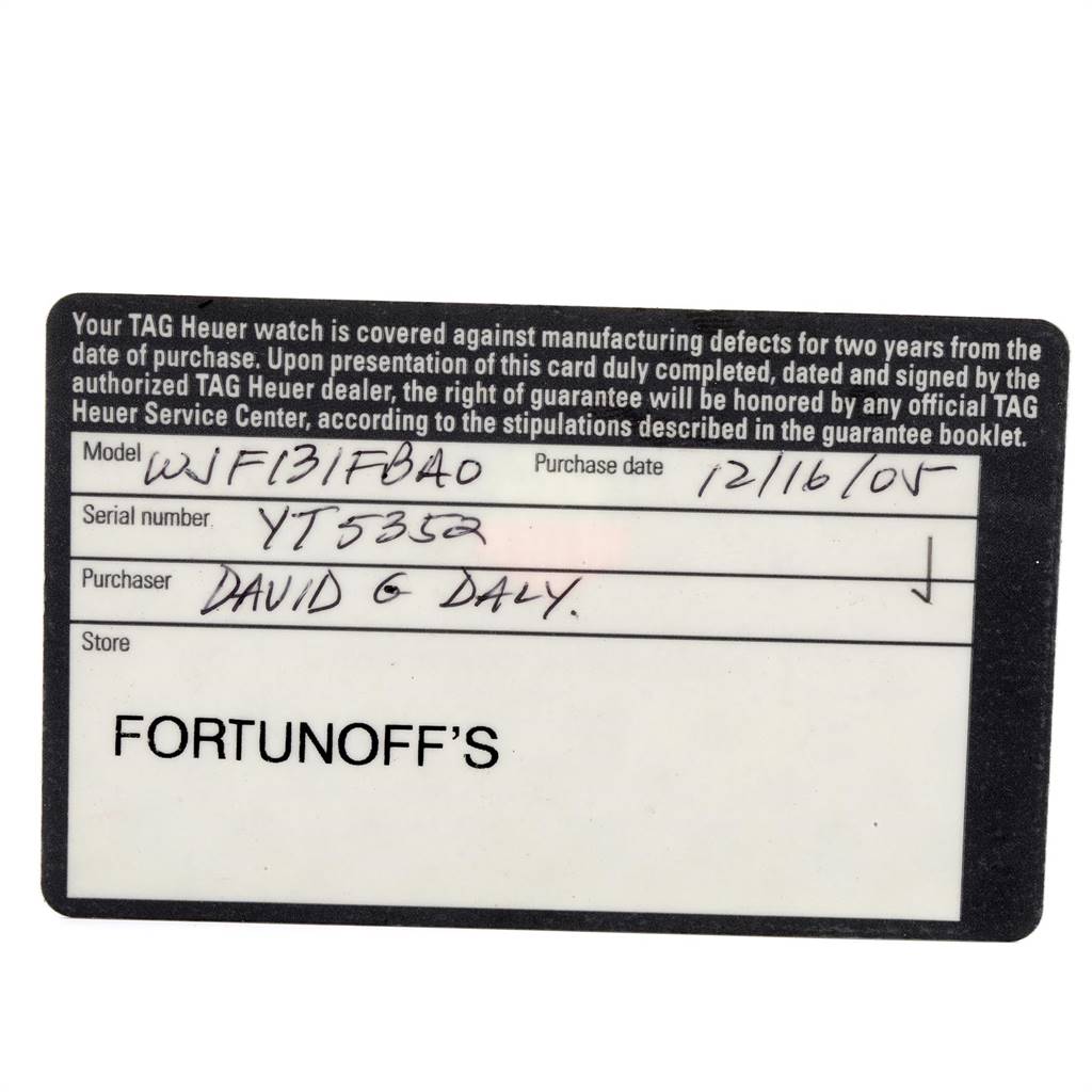 This image shows a warranty card for a Tag Heuer Link WJF131F.BA0572 Women's Stainless Steel Mother of Pearl Dial WJF131F.BA0572 Women's Stainless Steel Mother of Pearl Dial model watch, detailing model, serial number, purchaser, and store information.