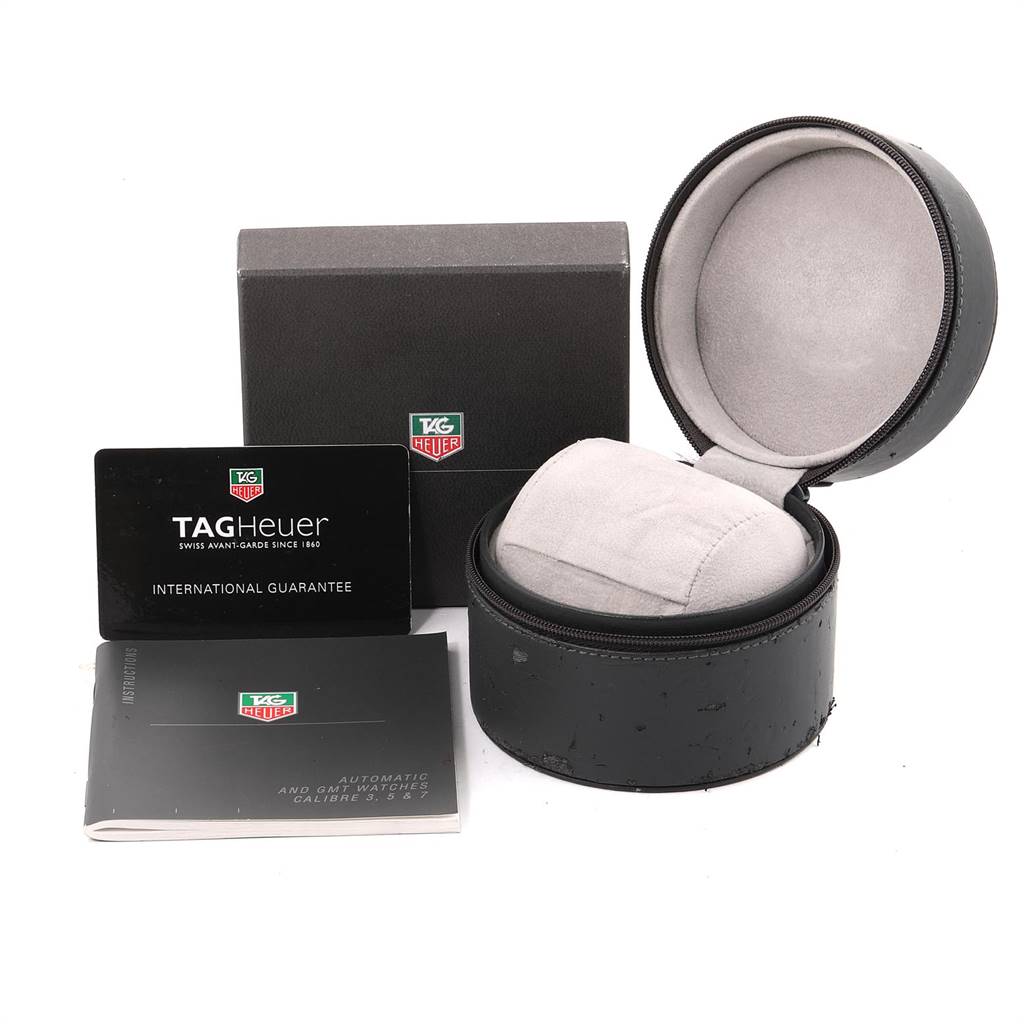 This image shows the Tag Heuer Aquaracer WAJ2110.BA0870 Men's Stainless Steel Black Dial WAJ2110.BA0870 Men's Stainless Steel Black Dial watch accessories, including the box, warranty card, and instruction manual.