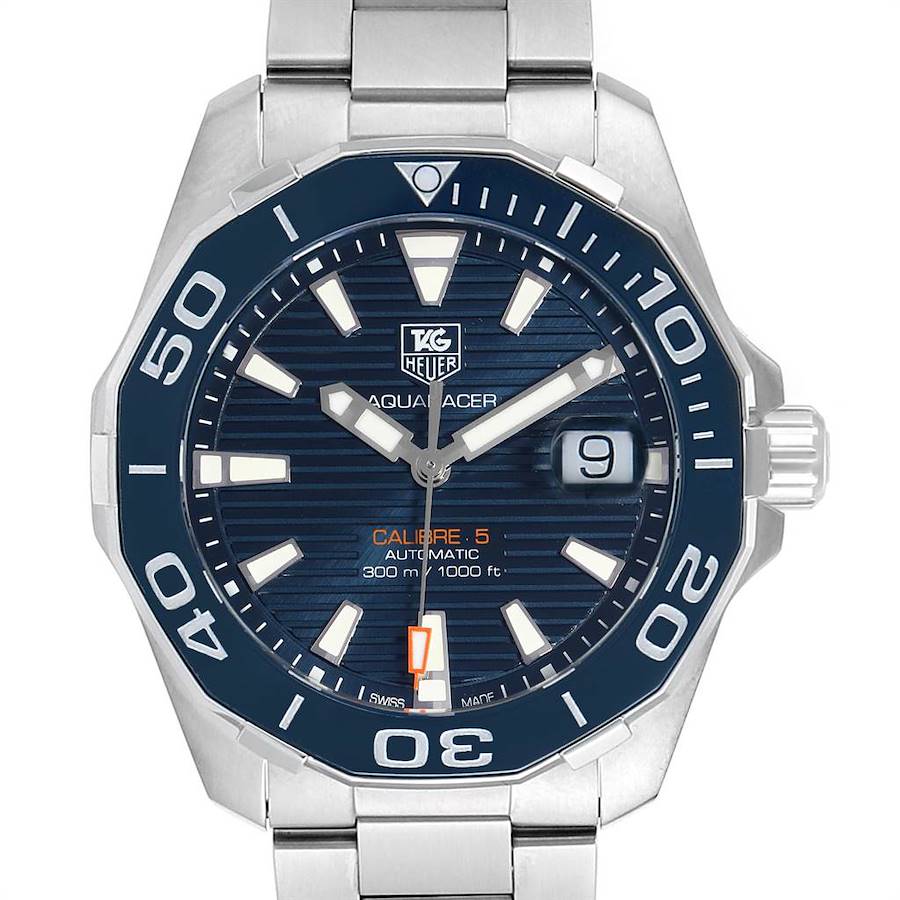 The Tag Heuer Aquaracer watch is shown from the front, highlighting its dial, bezel, hands, and stainless steel bracelet.