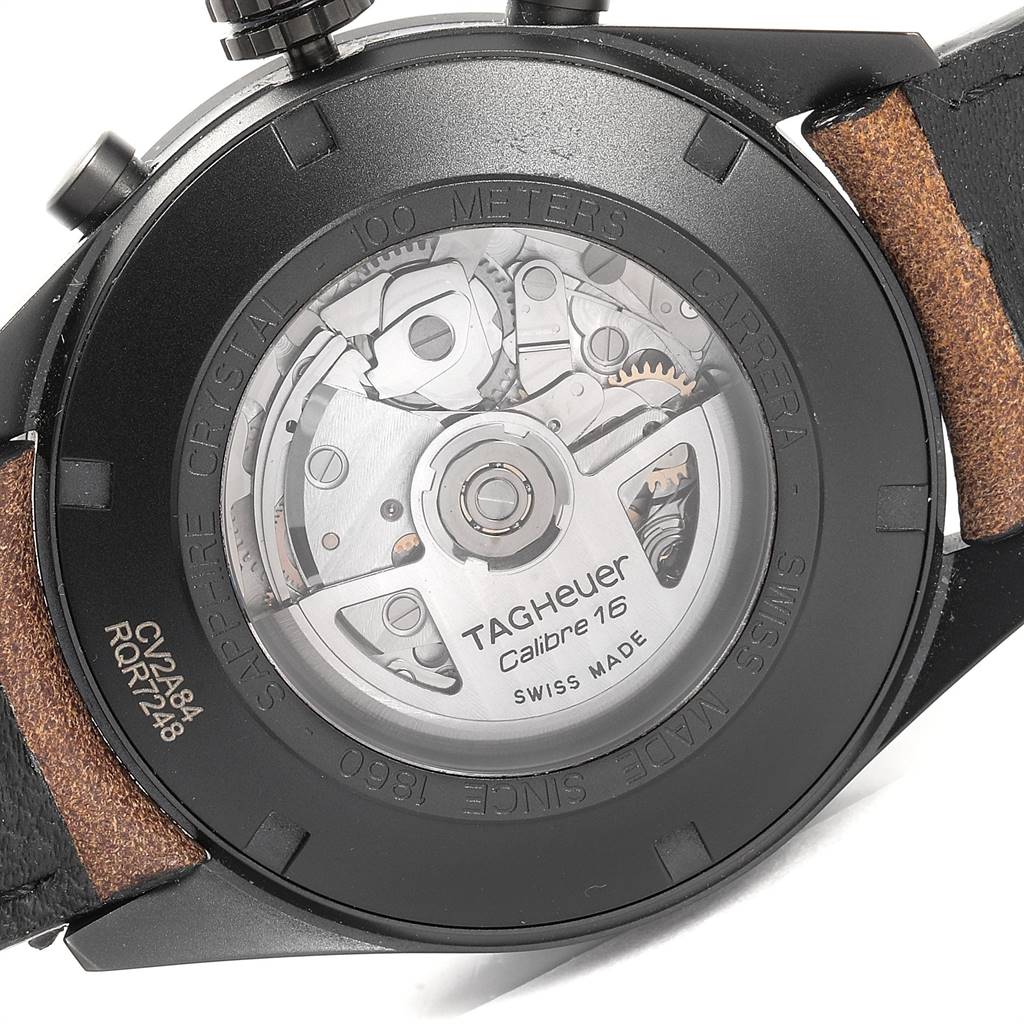 The image shows the back view of a Tag Heuer Carrera CV2A84.FC6394 Men's Titanium Black Dial CV2A84.FC6394 Men's Titanium Black Dial watch with visible internal mechanisms and "Calibre 16" inscription.