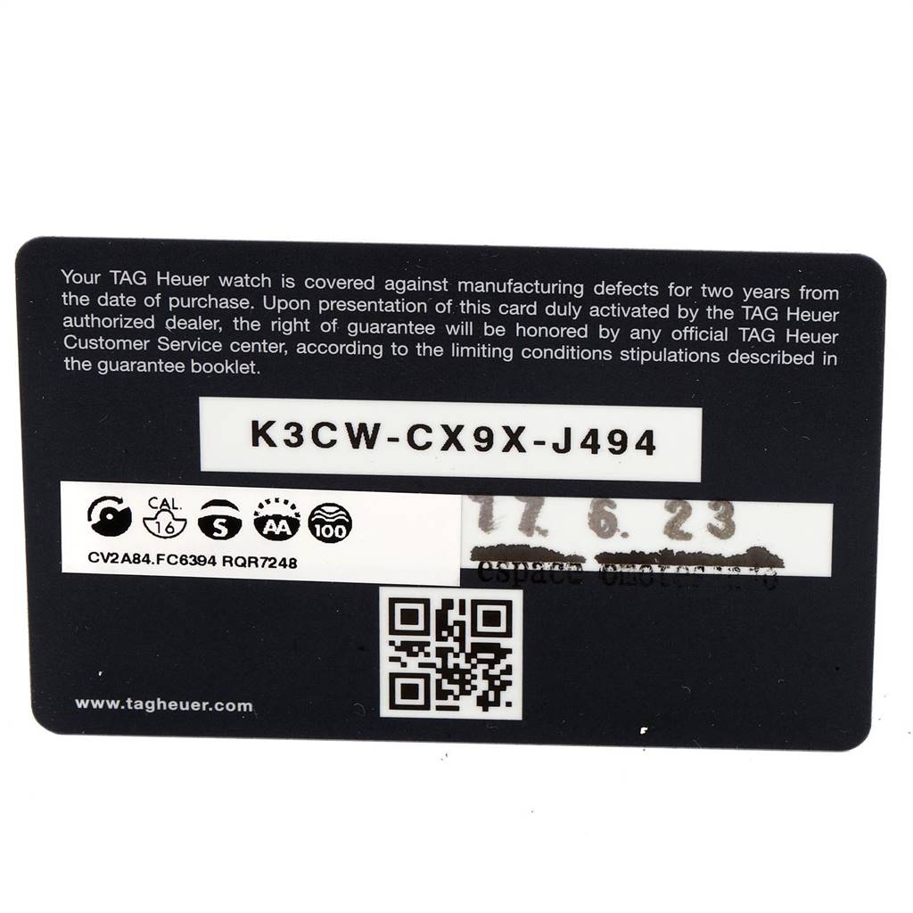 This is a warranty card for the Tag Heuer Carrera CV2A84.FC6394 Men's Titanium Black Dial CV2A84.FC6394 Men's Titanium Black Dial model, showing a serial code and guarantee details.